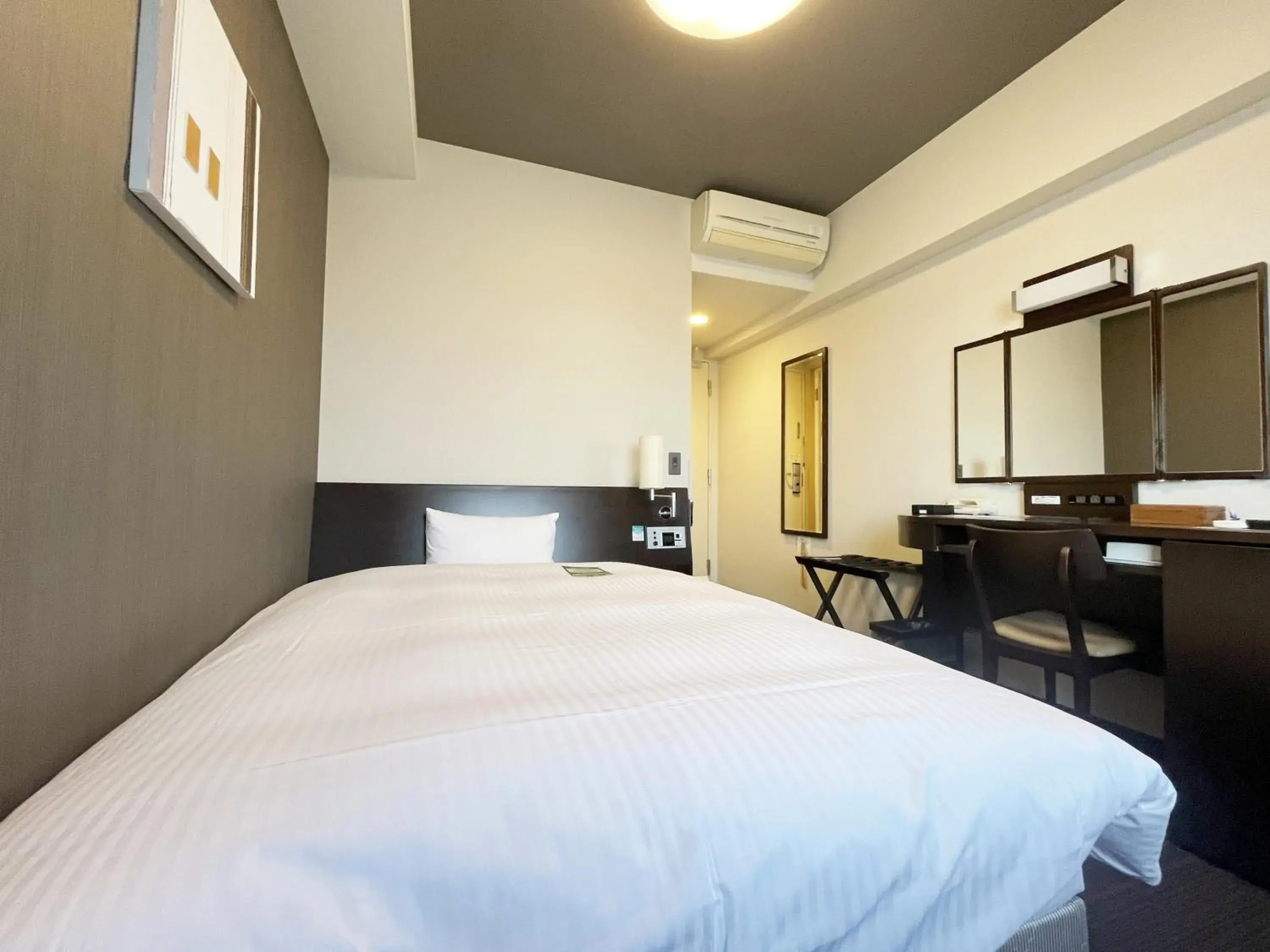 Photo of the whole room in Hotel Route-Inn Furukawa Ekimae Photo of the whole room in Hotel Route-Inn Furukawa Ekimae