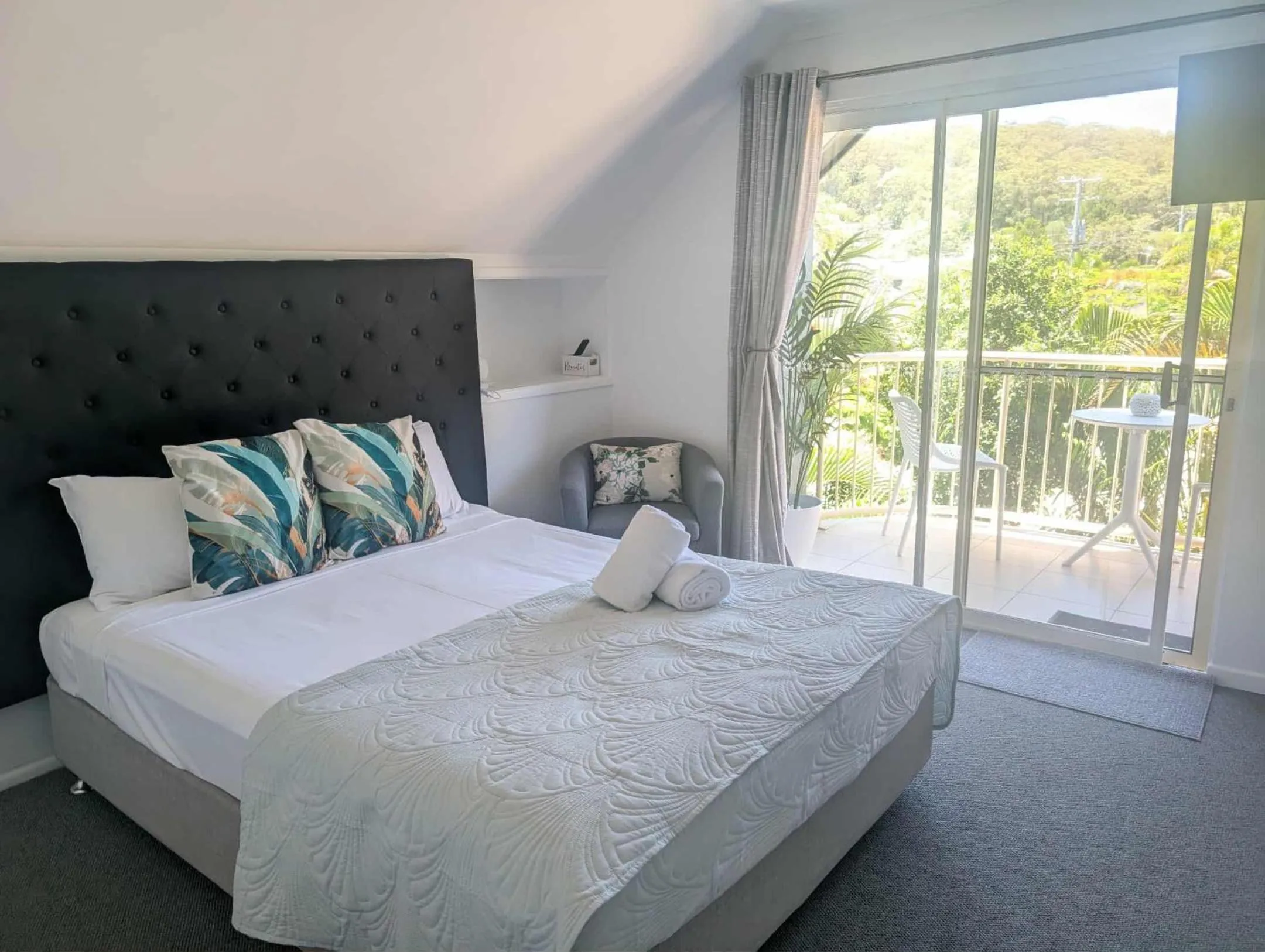 Bed in Rainbow Getaway Holiday Apartments