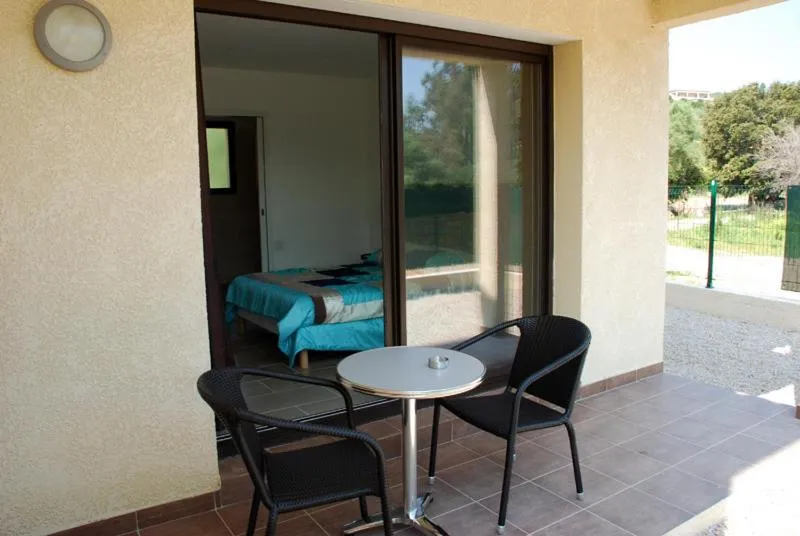 Patio in Hôtel l'Alivu