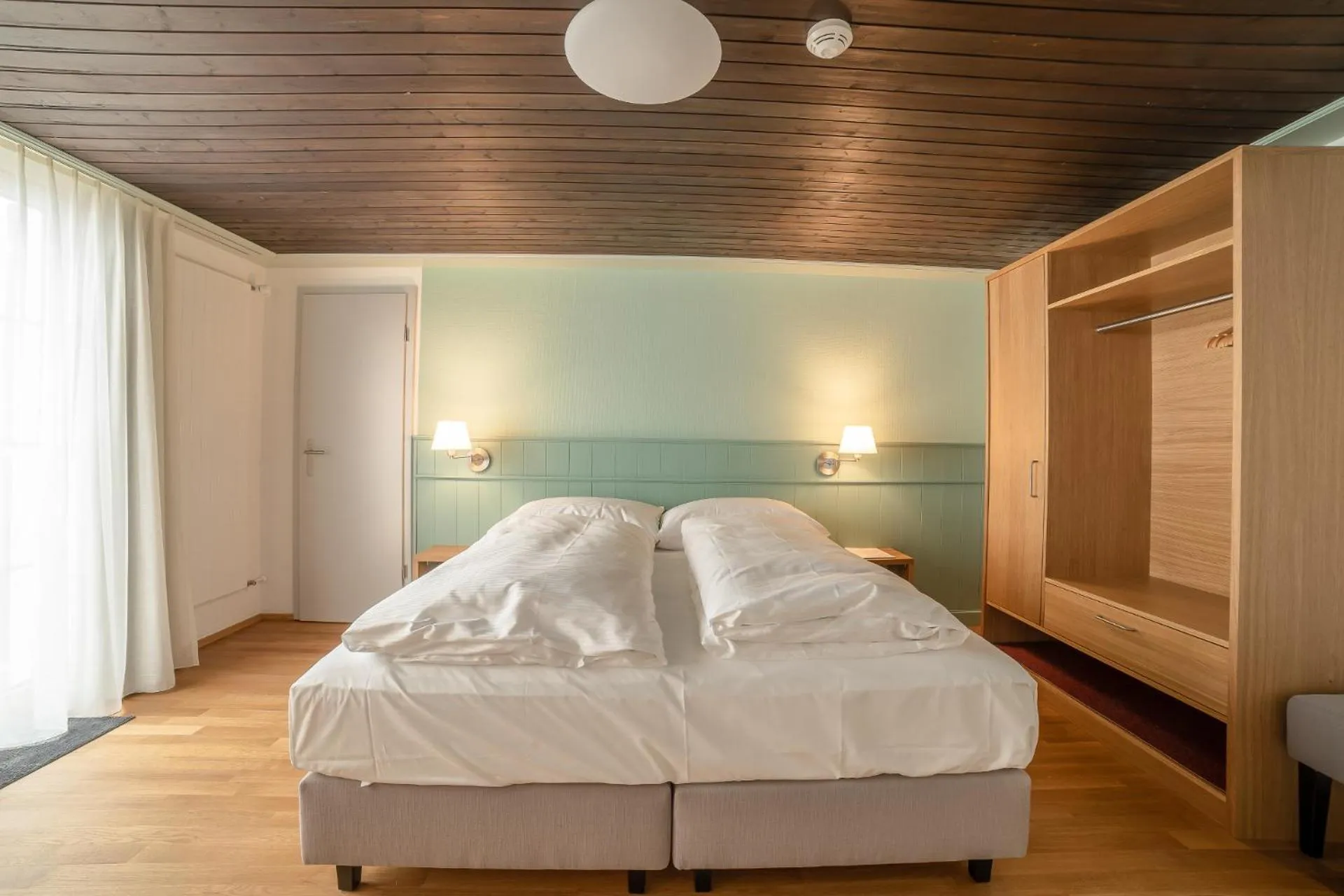 Photo of the whole room, Bed in Gasthaus Friedegg