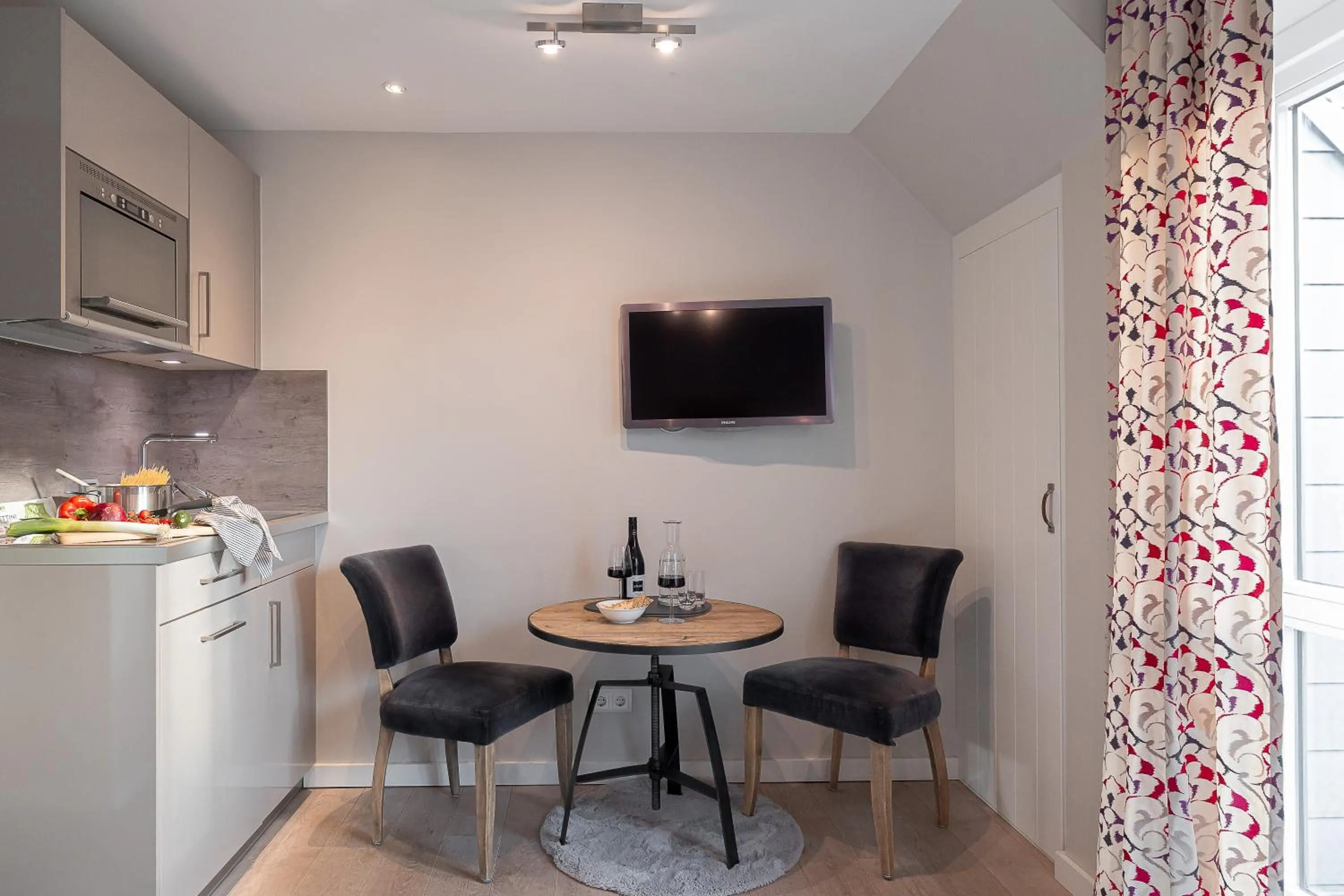 TV and multimedia in Apartmenthotel am Leuchtturm