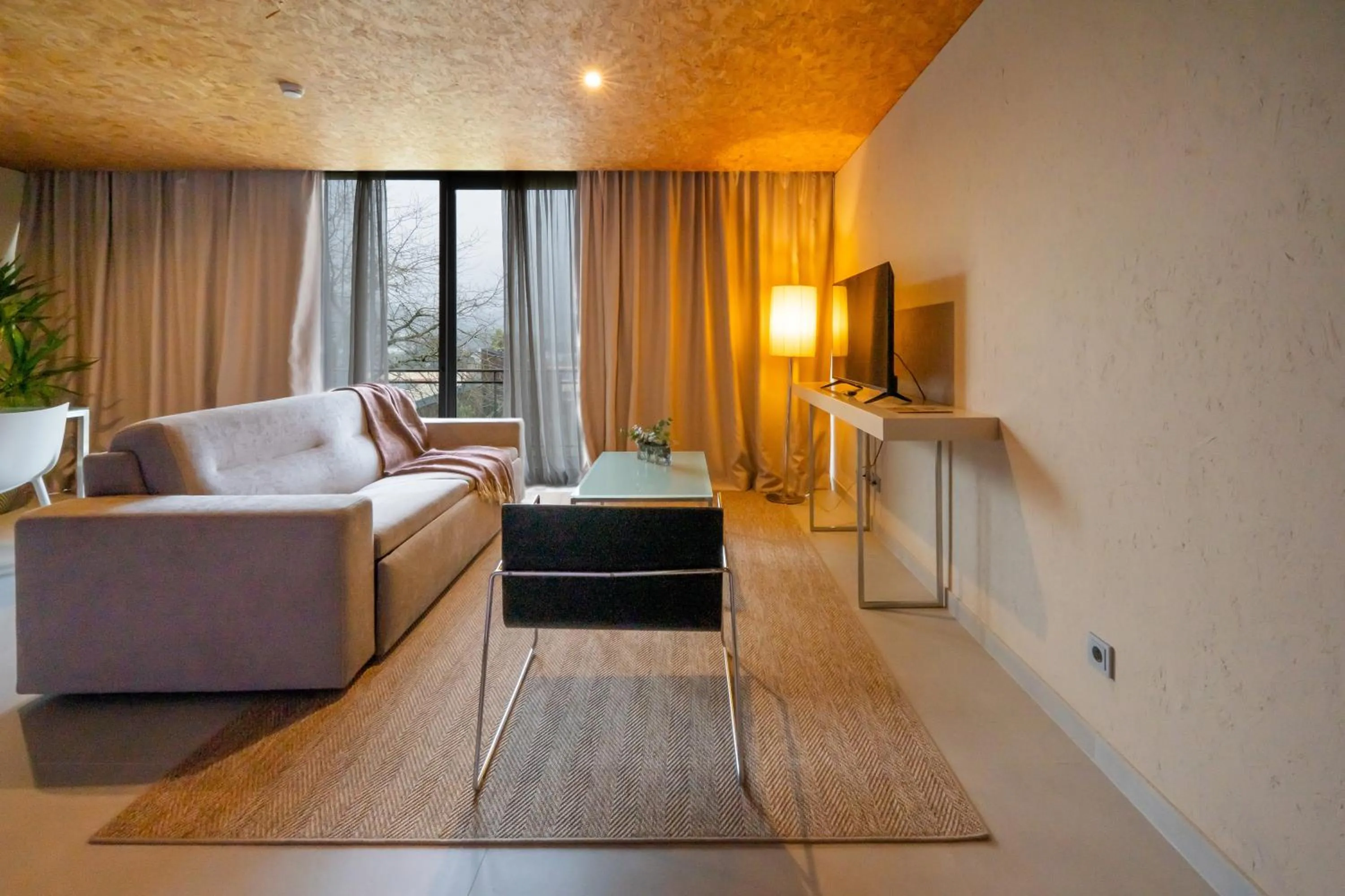 Living room, Bed in Paraíso Villas & Spa