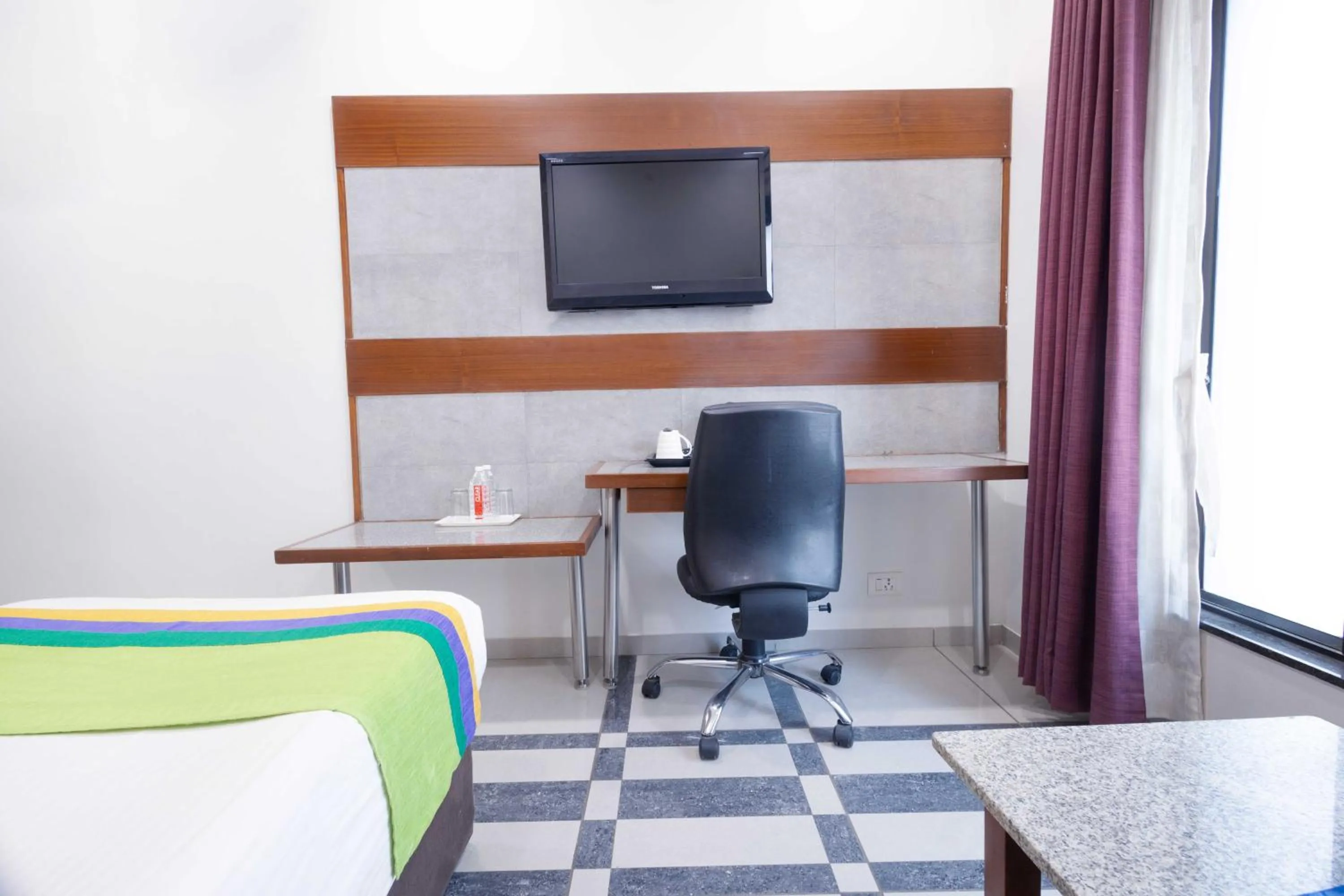 Bedroom in Treebo Ambassador