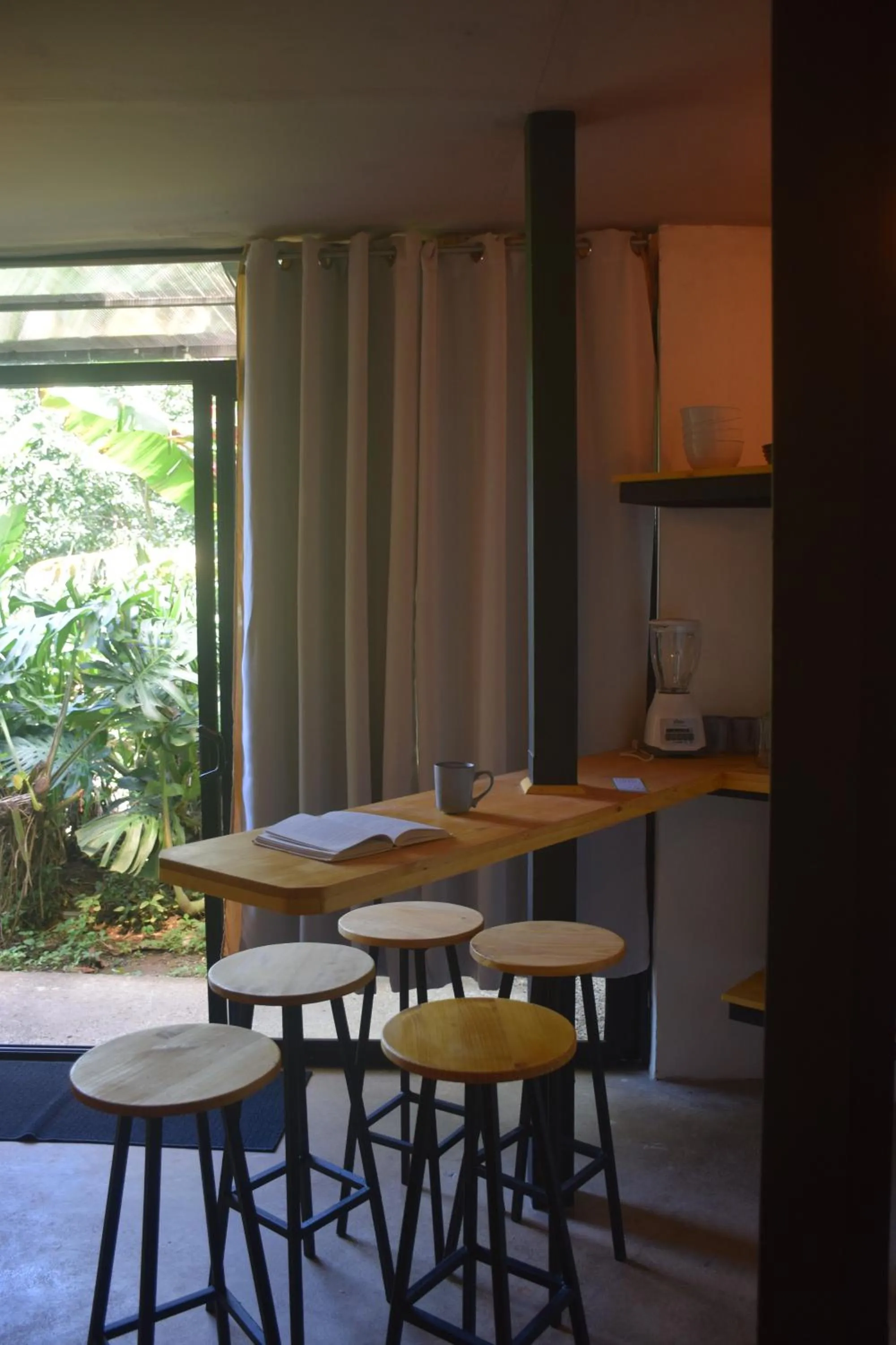 Dining area in OutBox Inn
