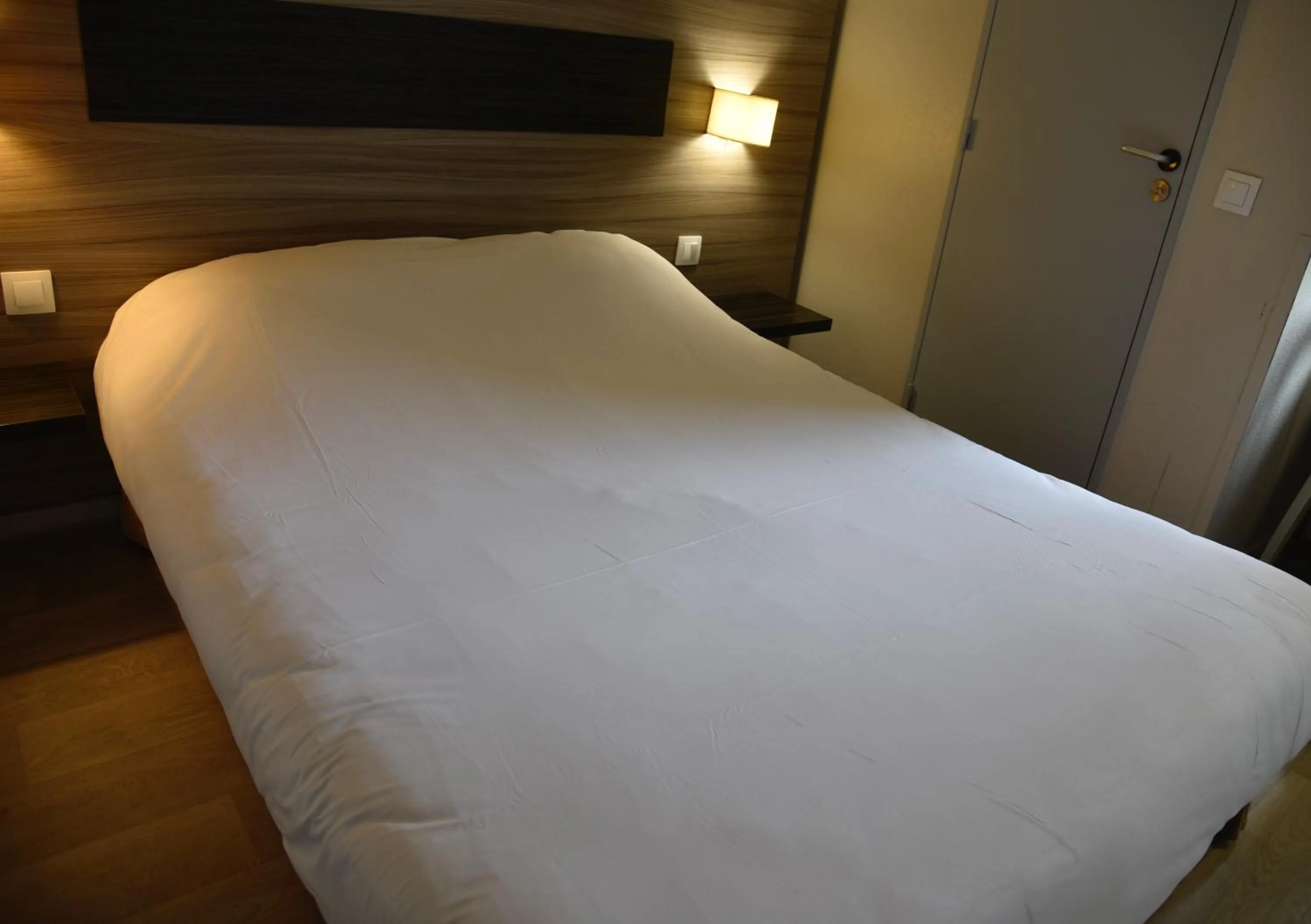 Bed in Hotel du Triangle