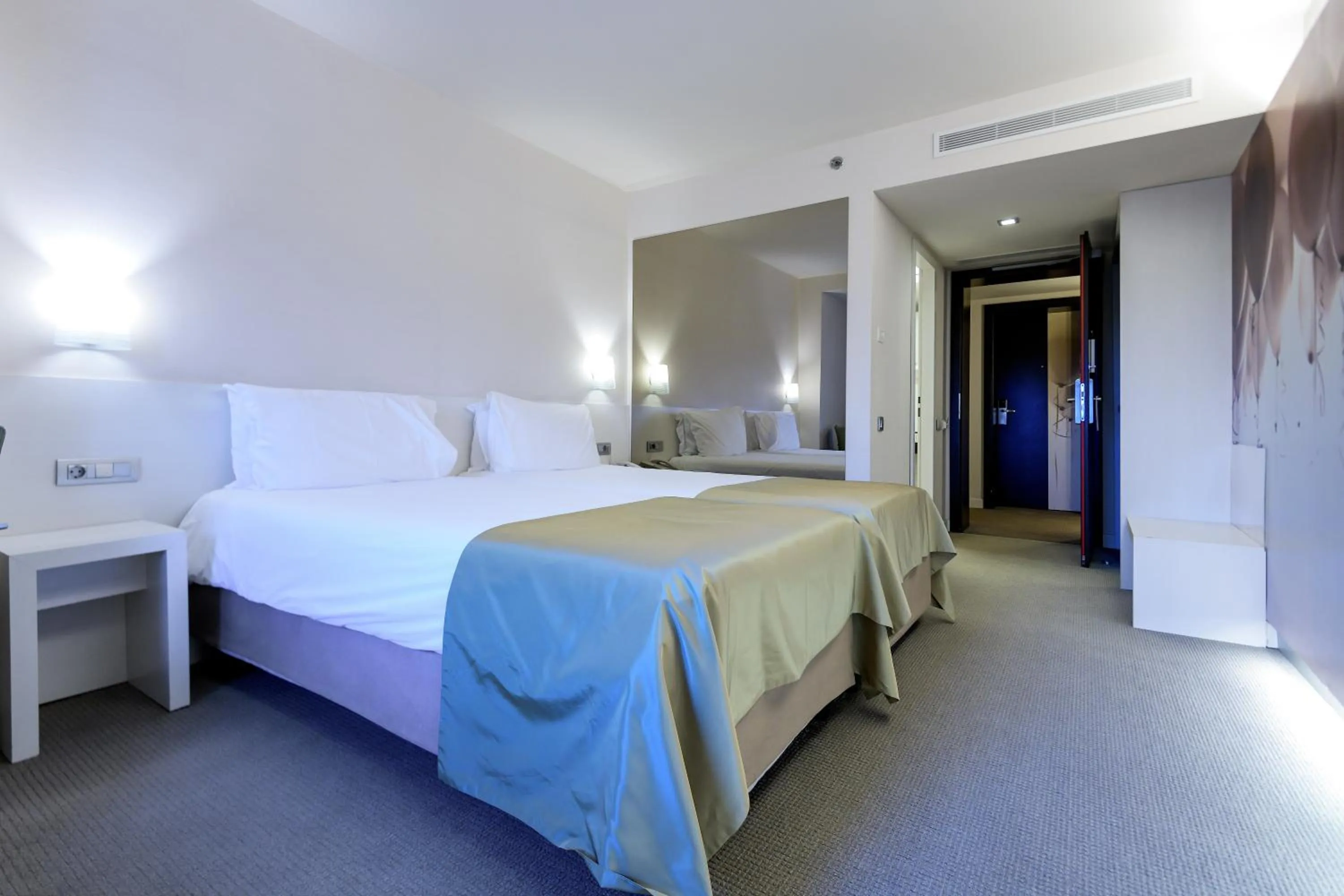 Photo of the whole room, Bed in Ramada Plaza by Wyndham Bucharest Convention Center