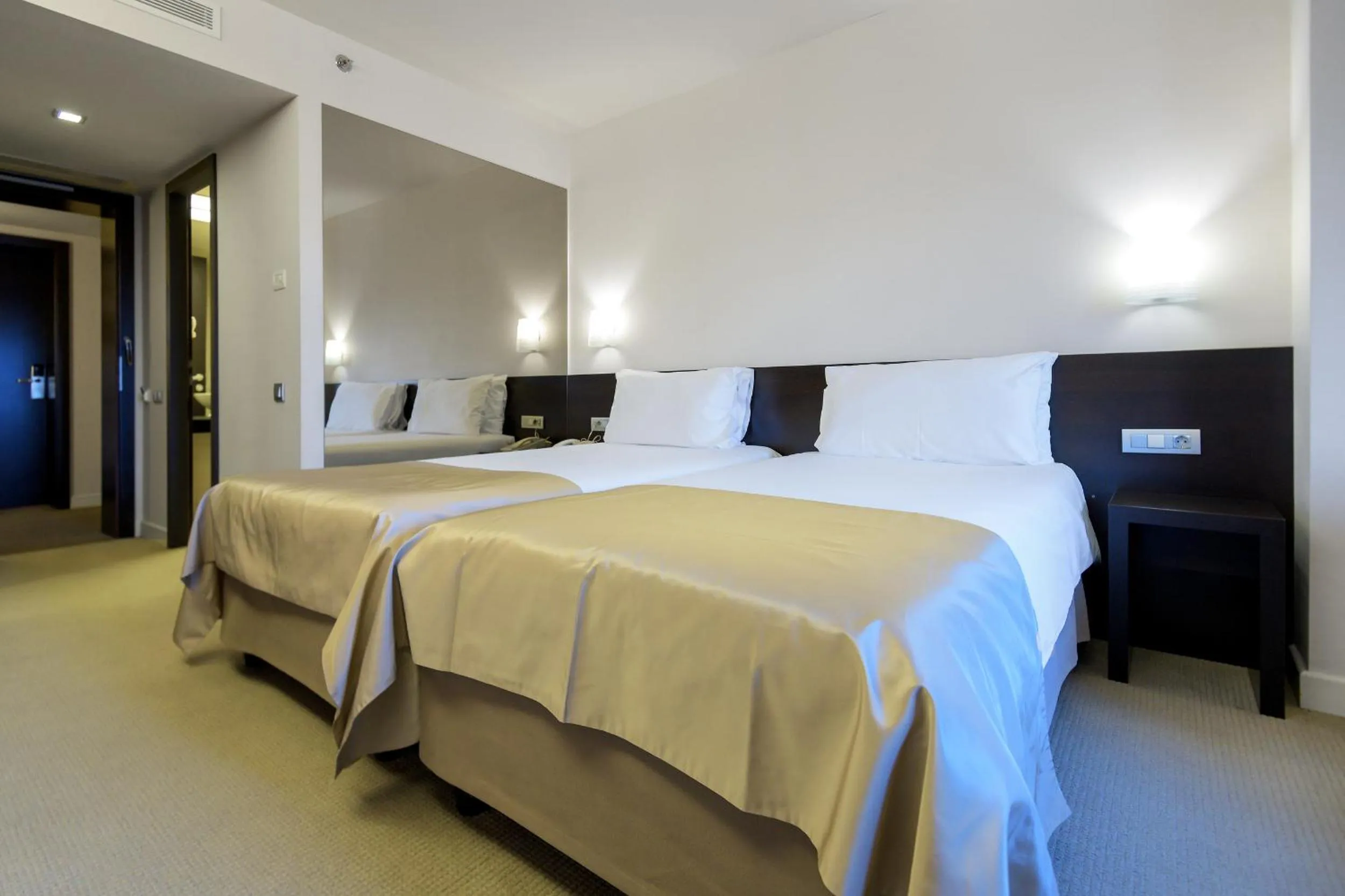 Bed in Ramada Plaza by Wyndham Bucharest Convention Center