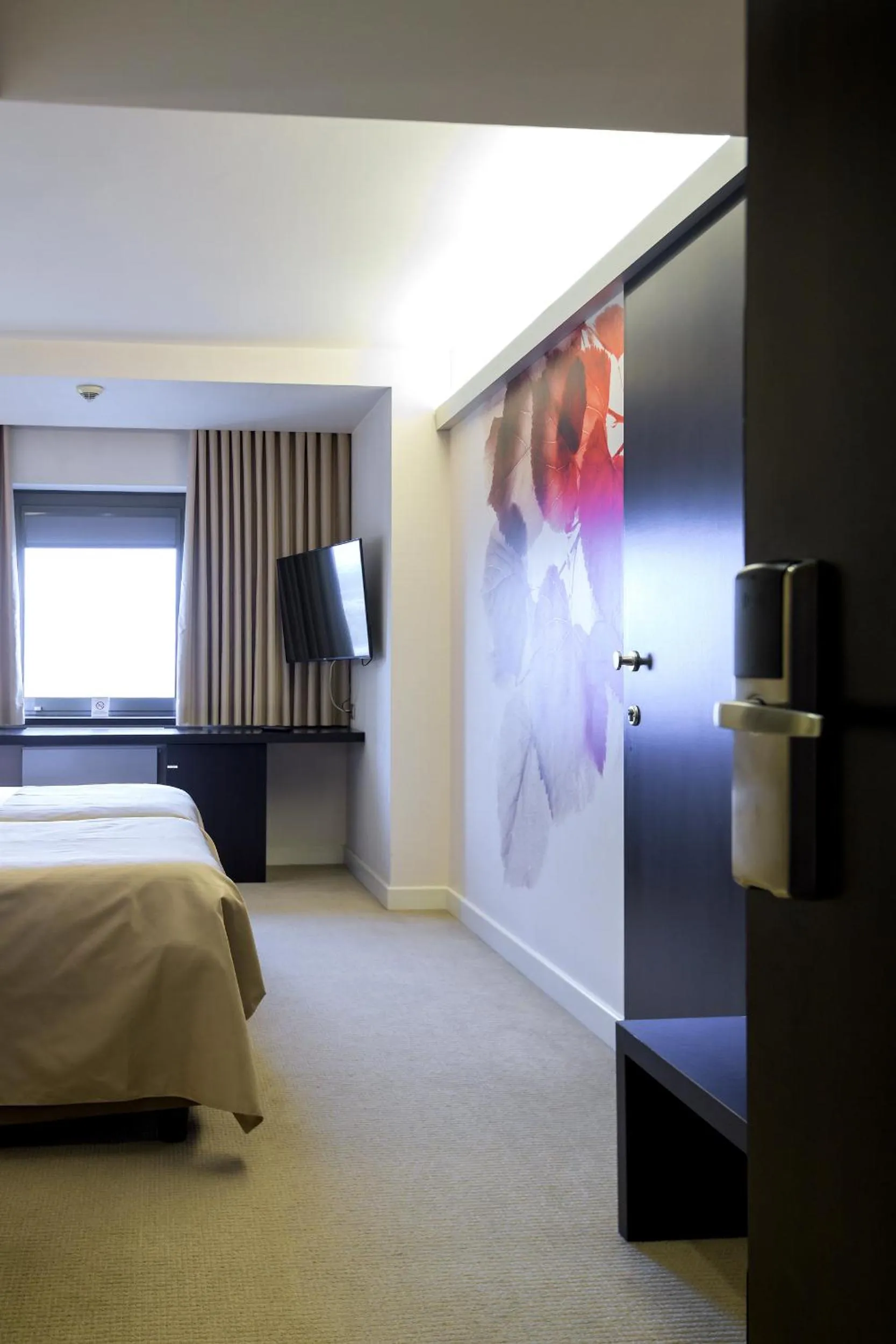 Bed in Ramada Plaza by Wyndham Bucharest Convention Center