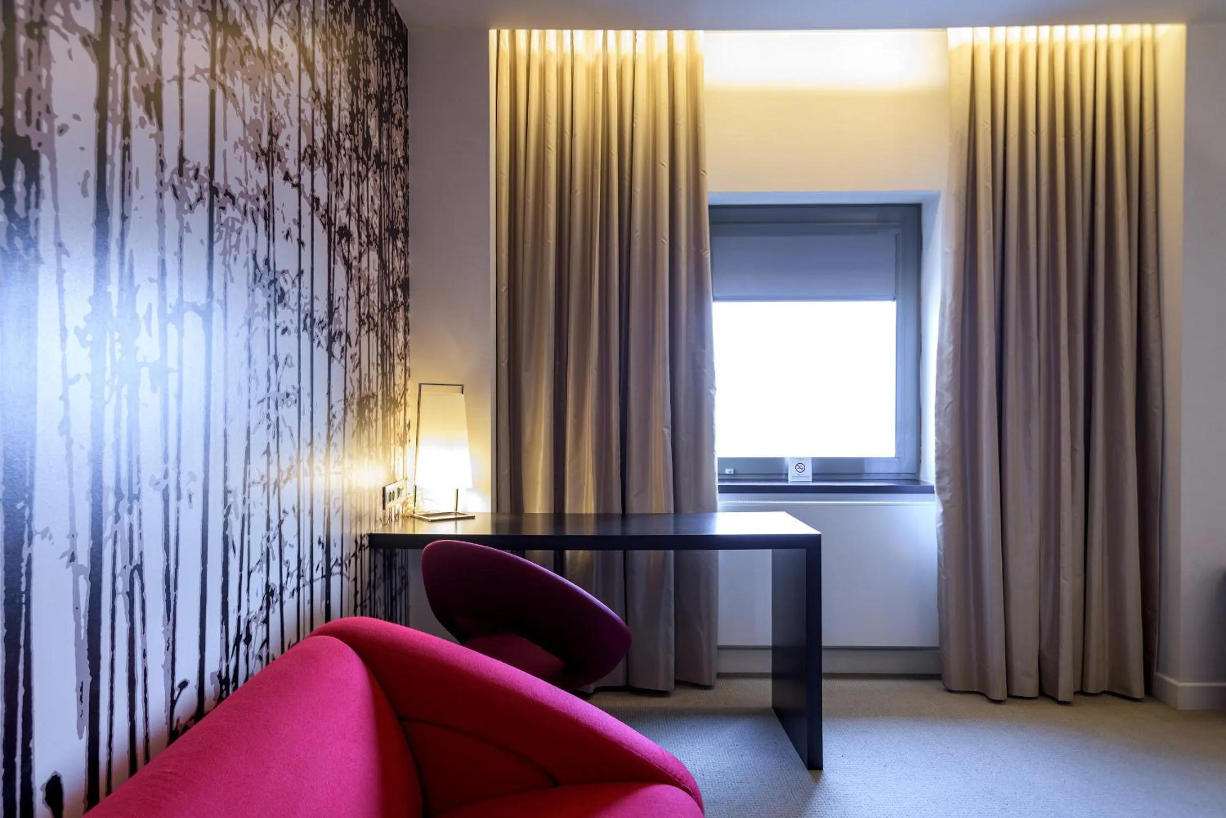 Seating area in Ramada Plaza by Wyndham Bucharest Convention Center