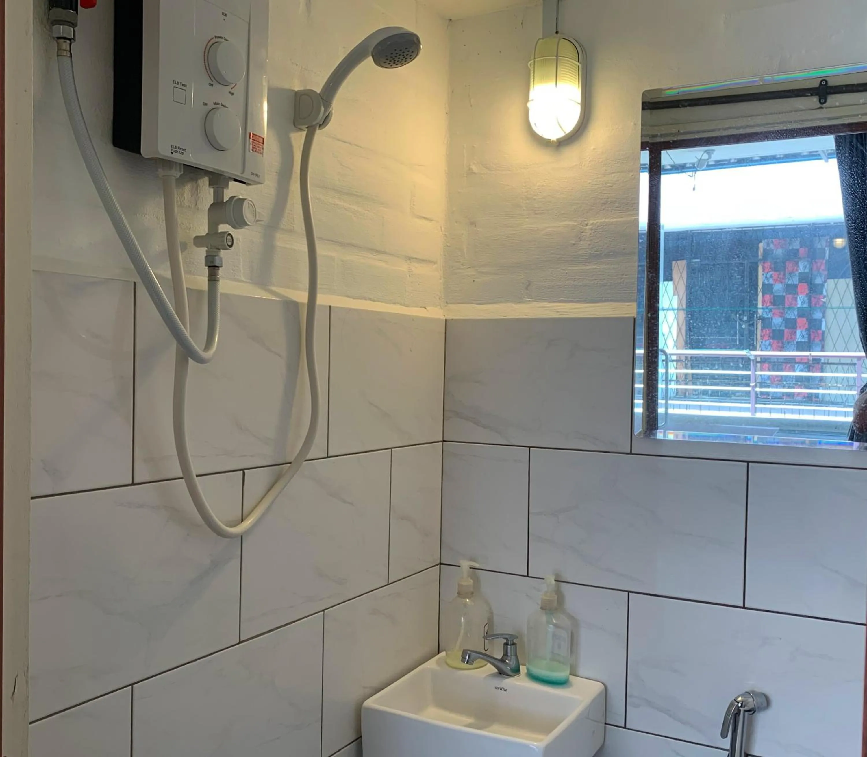 Bathroom in AE Semporna Guesthouse 极潜旅店