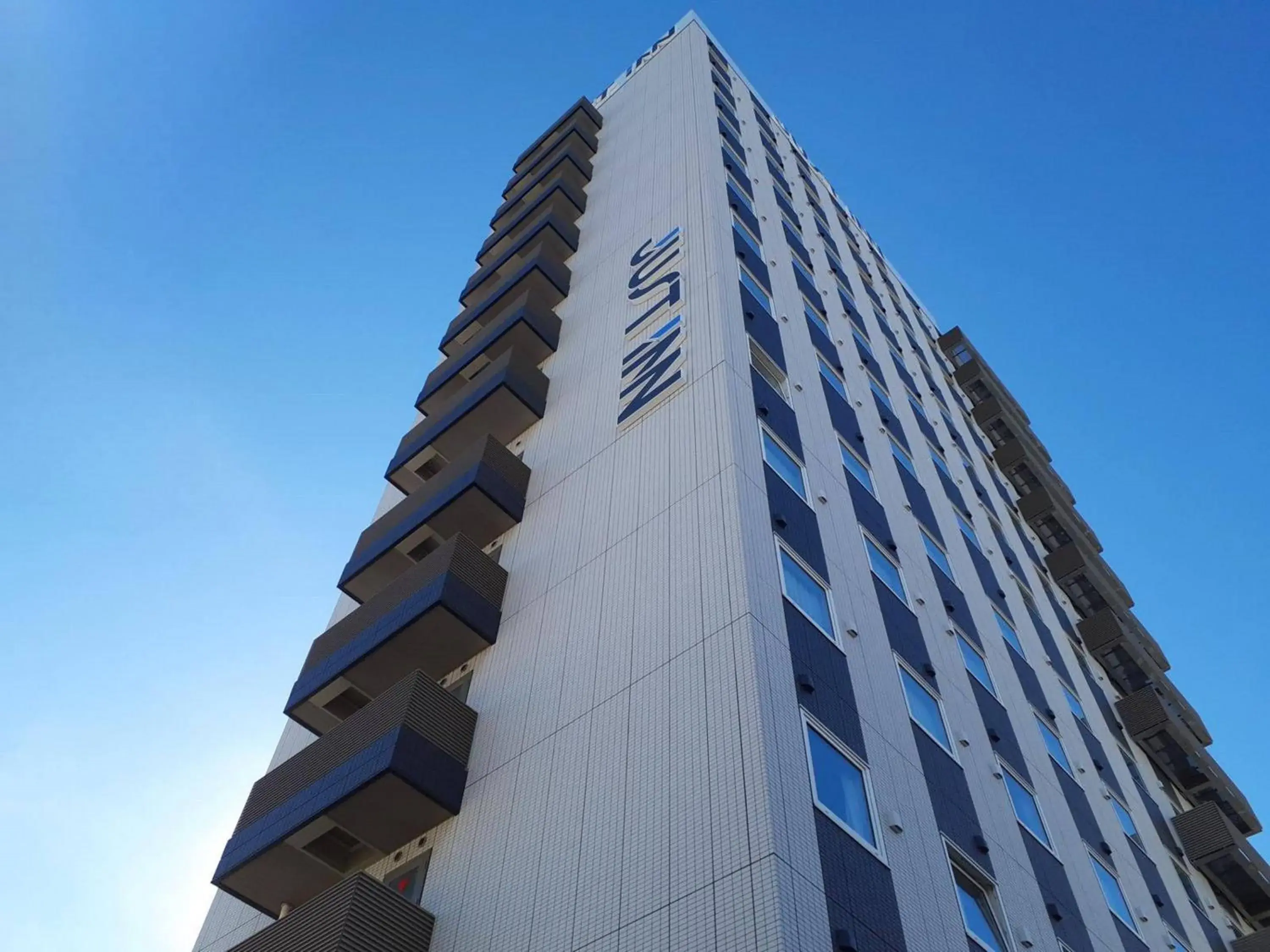 Property building in Just Inn Premium Toyohashi Station Property building in Just Inn Premium Toyohashi Station