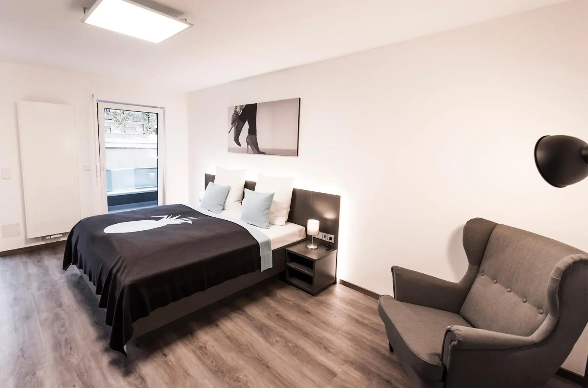 Photo of the whole room, Bed in Mood contemporary living