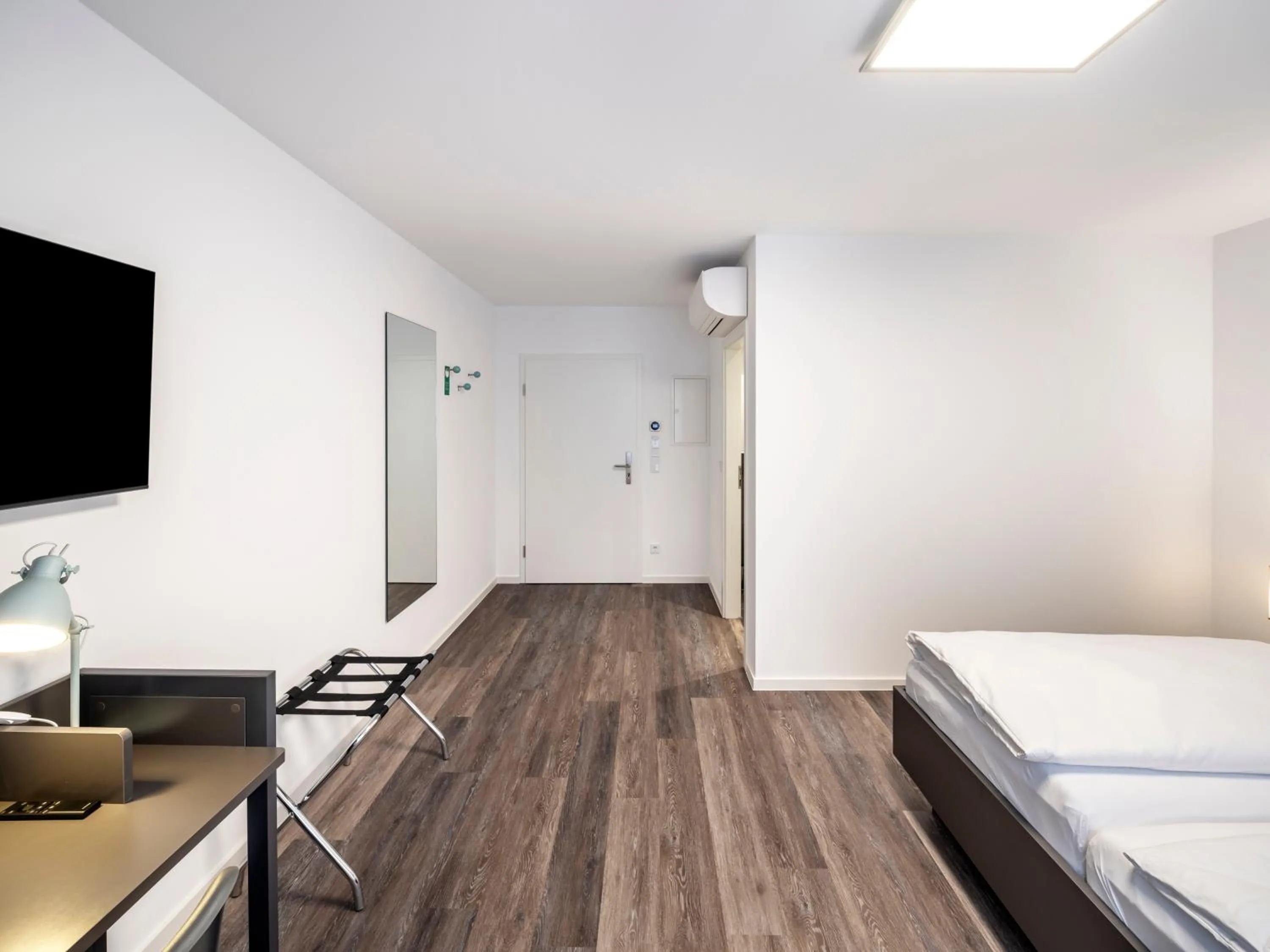 Photo of the whole room, Bed in Mood contemporary living