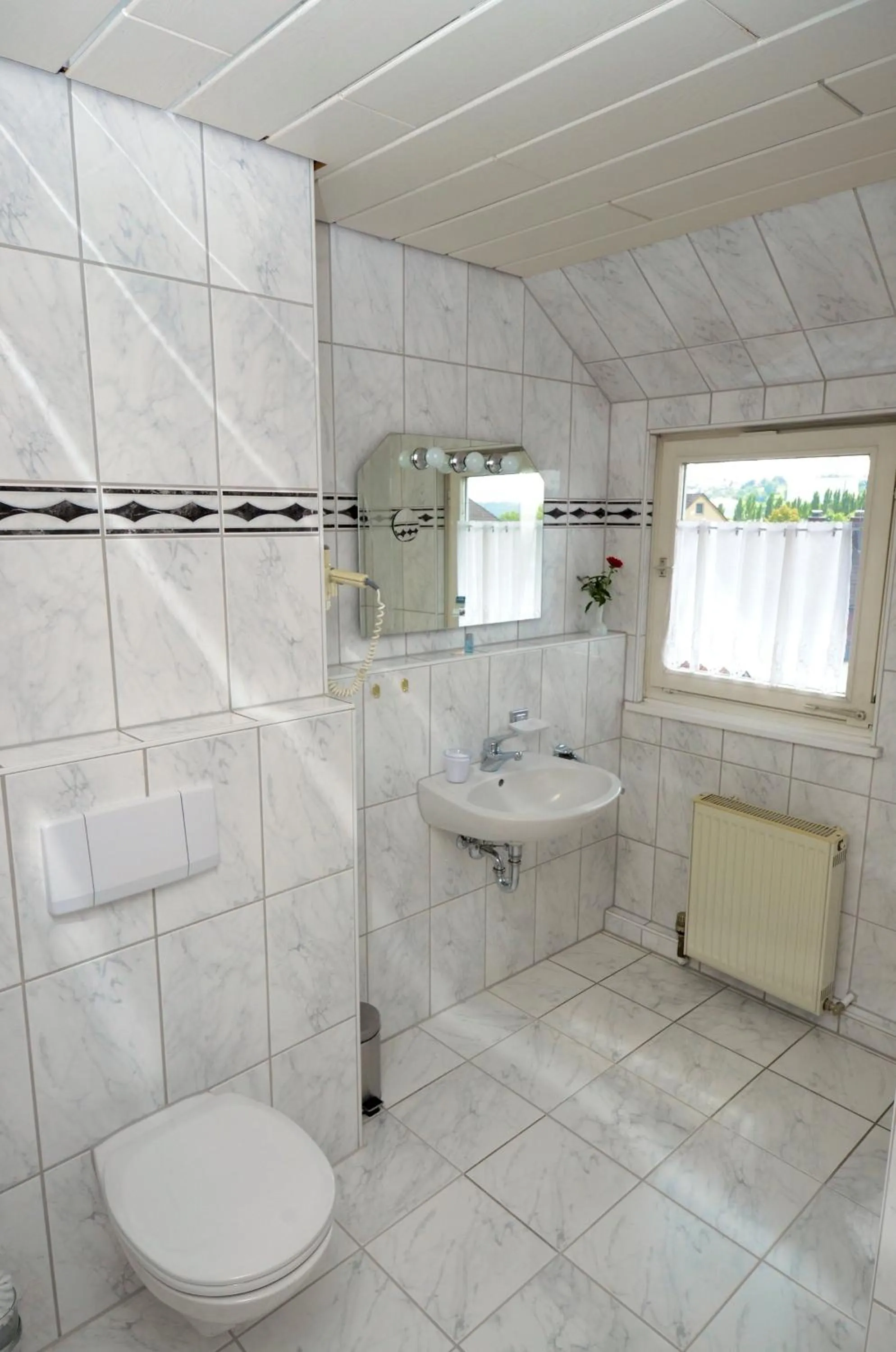 Bathroom in Hotel Altbacher Hof