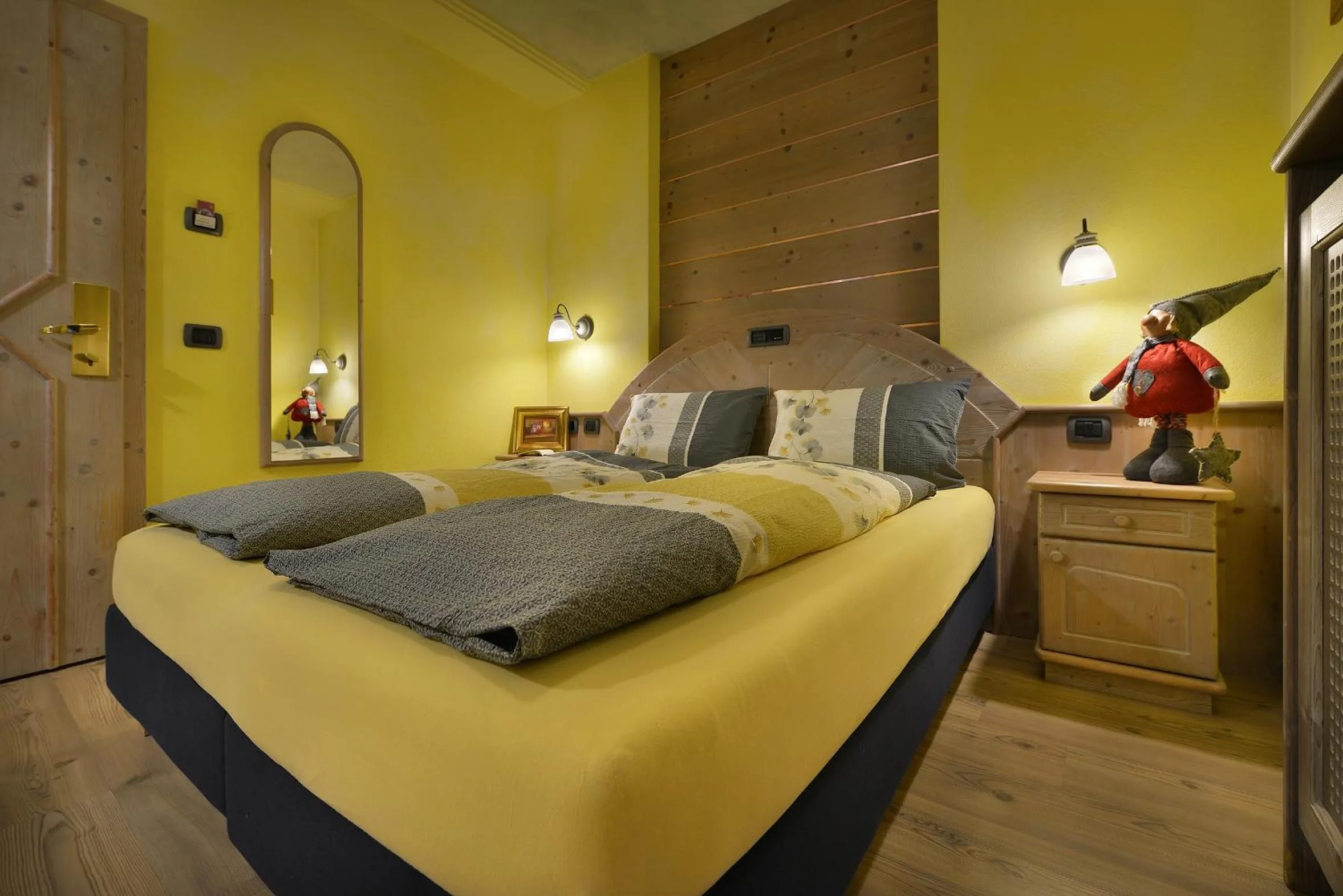 Bed in Hotel Piccolo Mondo