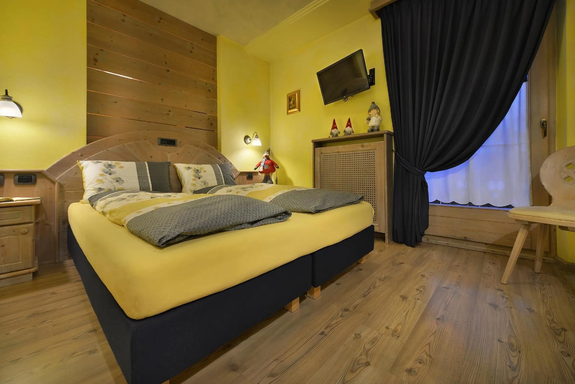 Bed in Hotel Piccolo Mondo