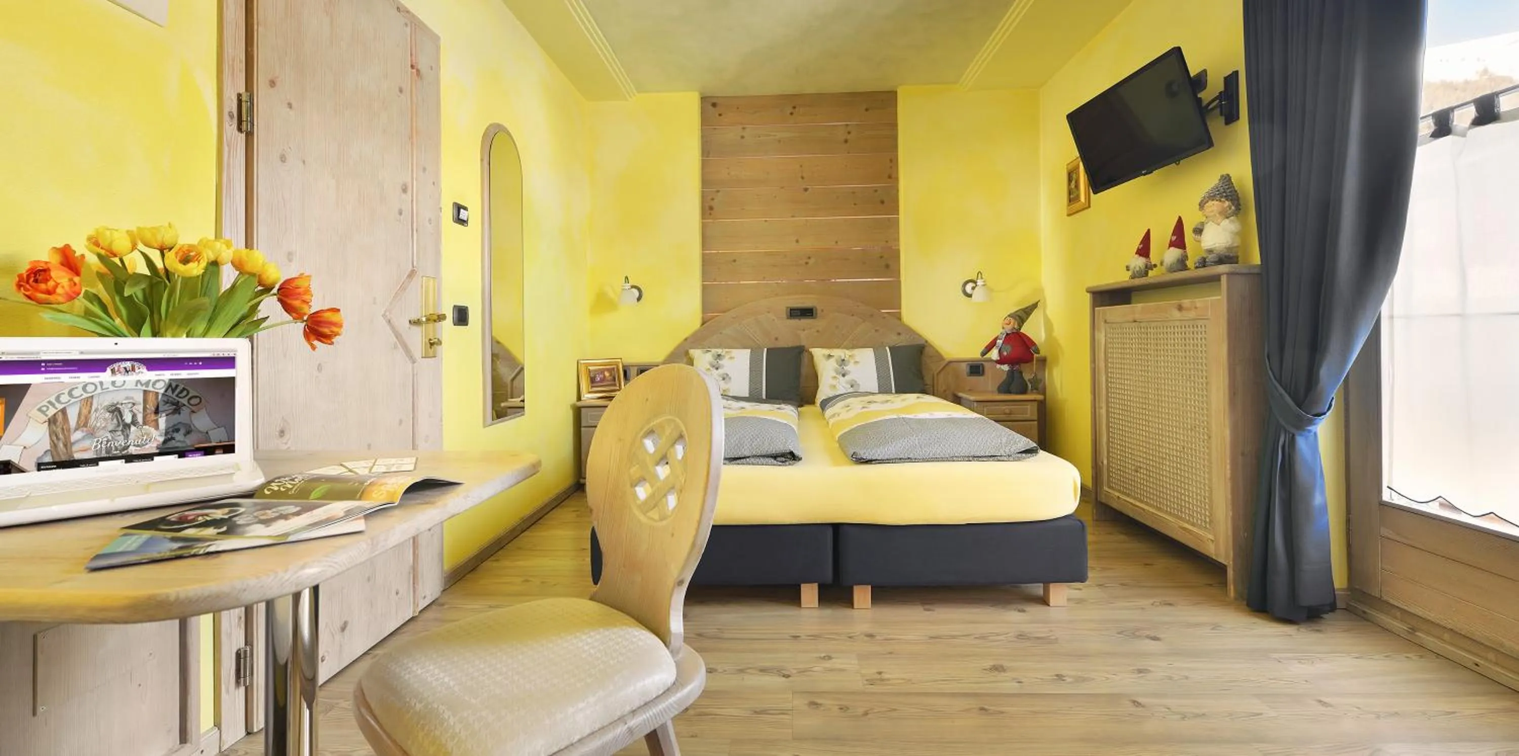 Bed in Hotel Piccolo Mondo