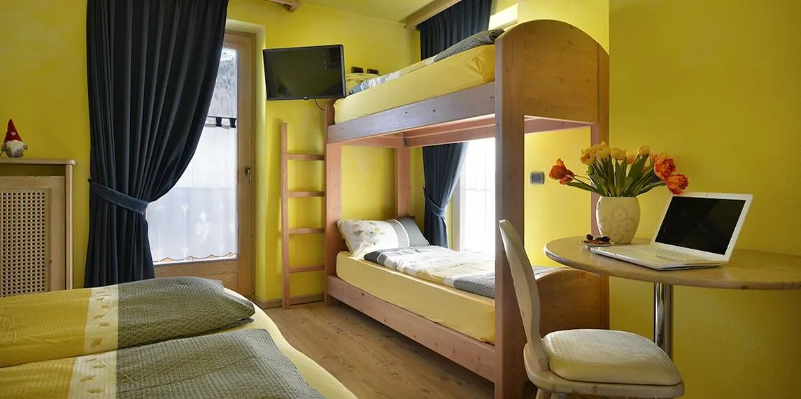 Bed in Hotel Piccolo Mondo