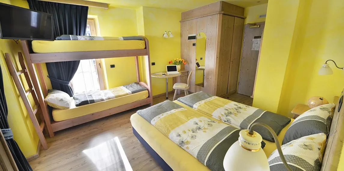 Bed in Hotel Piccolo Mondo