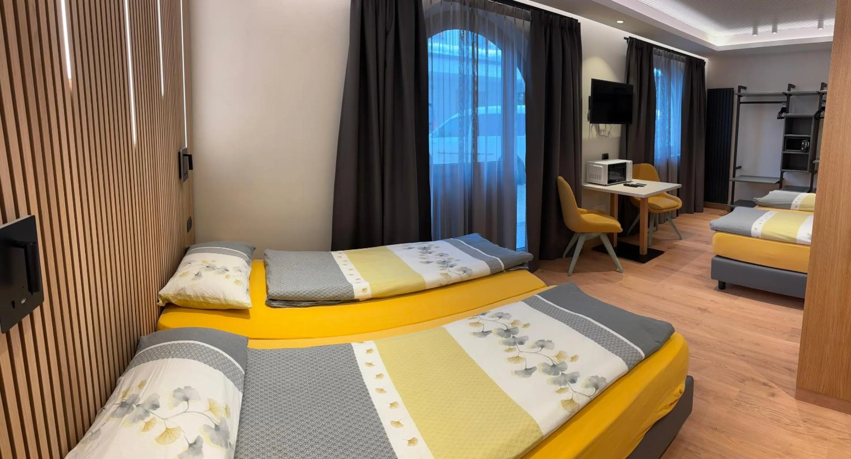 Bed in Hotel Piccolo Mondo