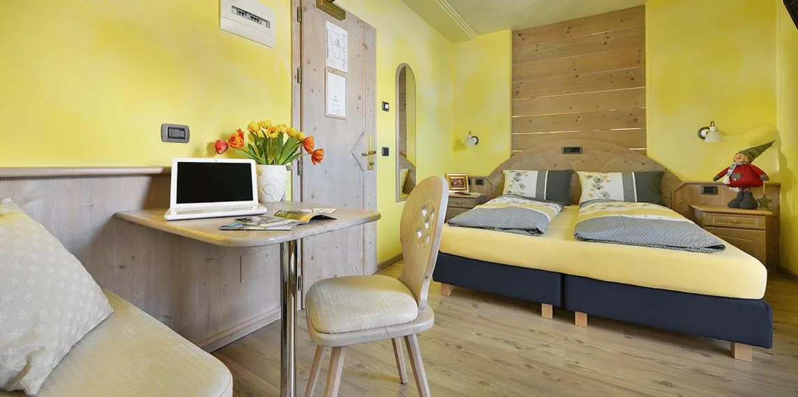 Bed in Hotel Piccolo Mondo