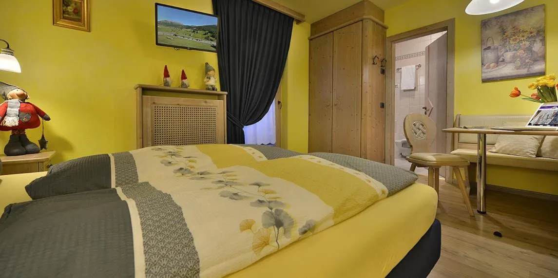 Bed in Hotel Piccolo Mondo