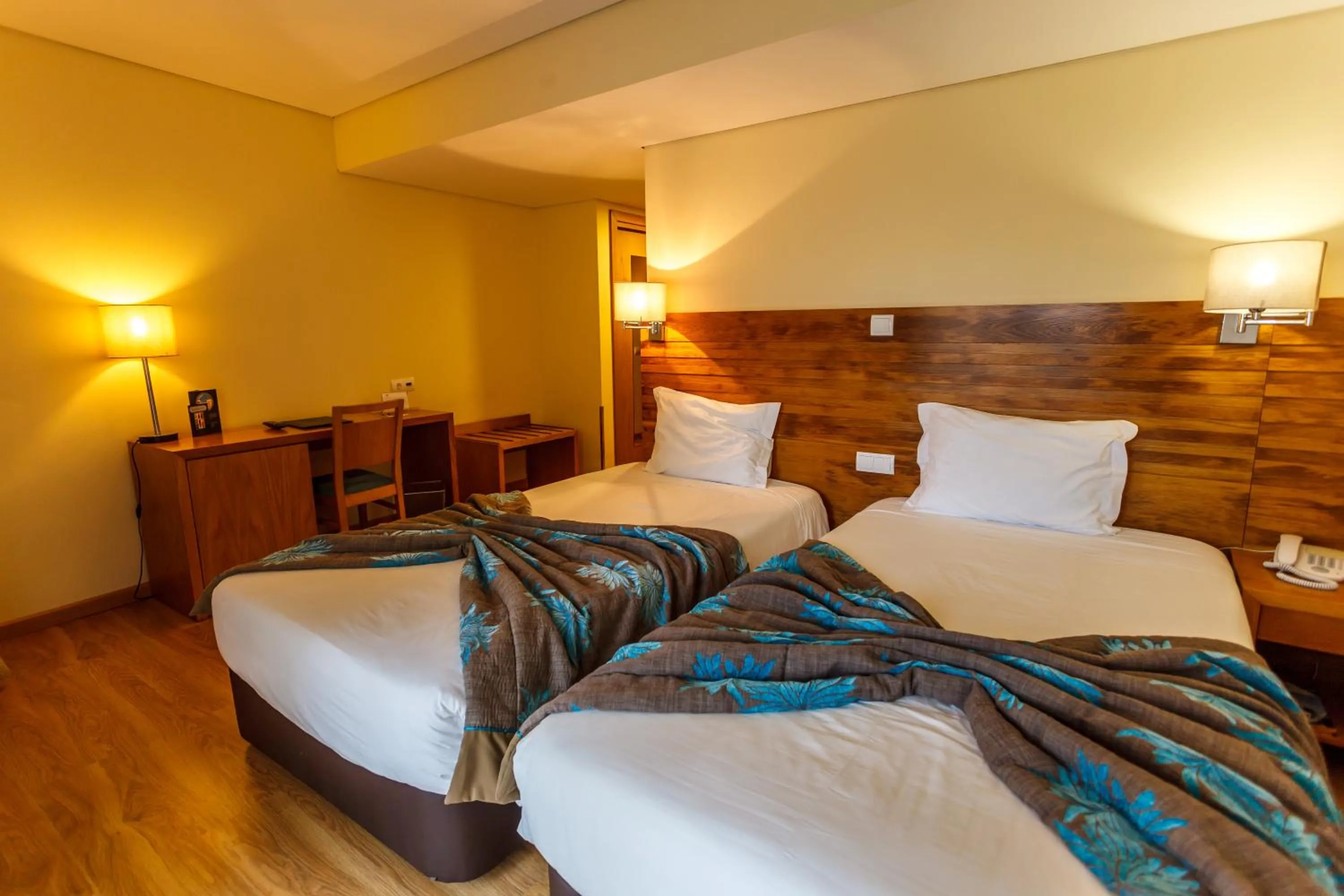 Bed in Hotel Caravelas