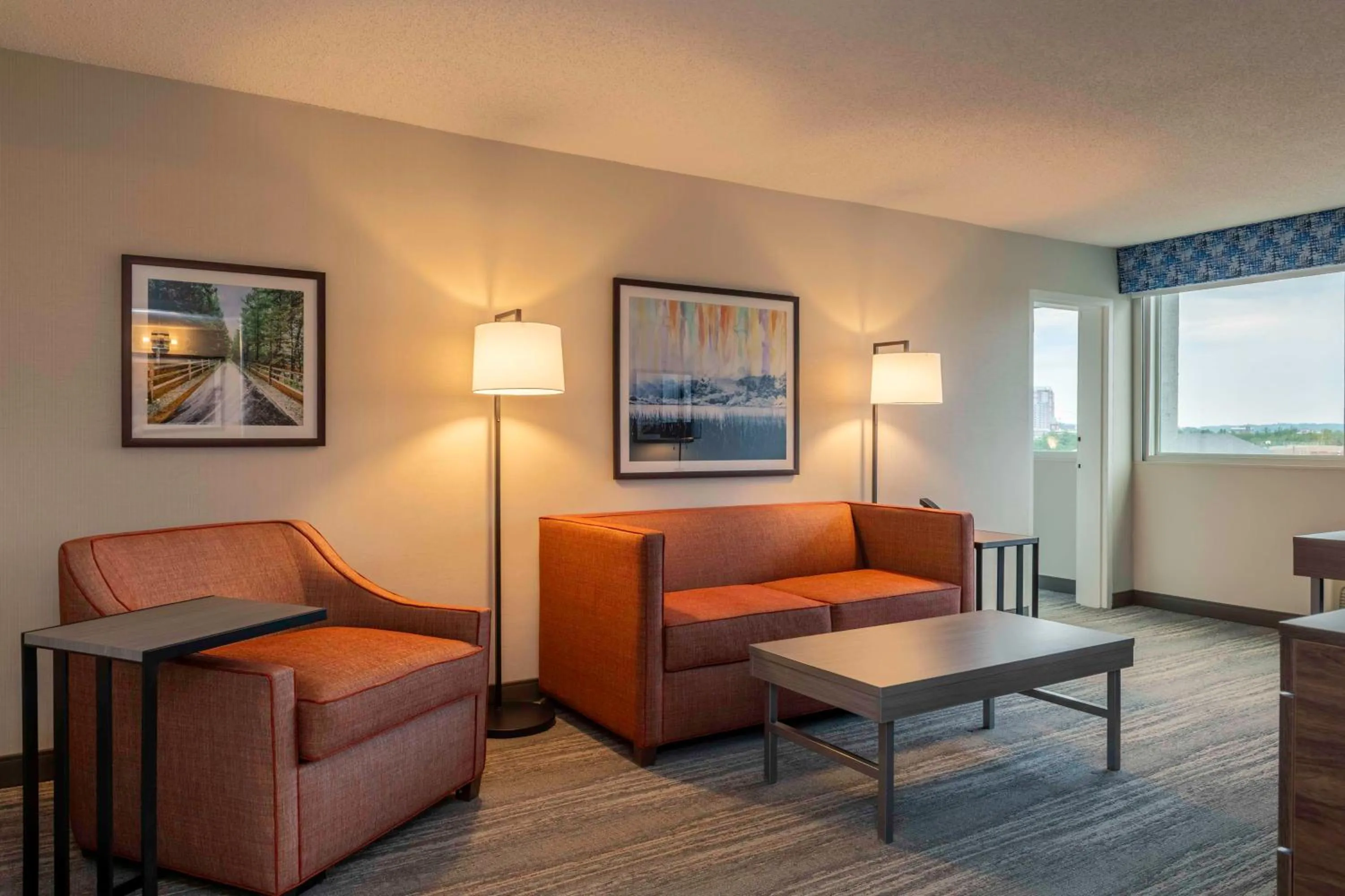 Living room in La Quinta by Wyndham Manchester