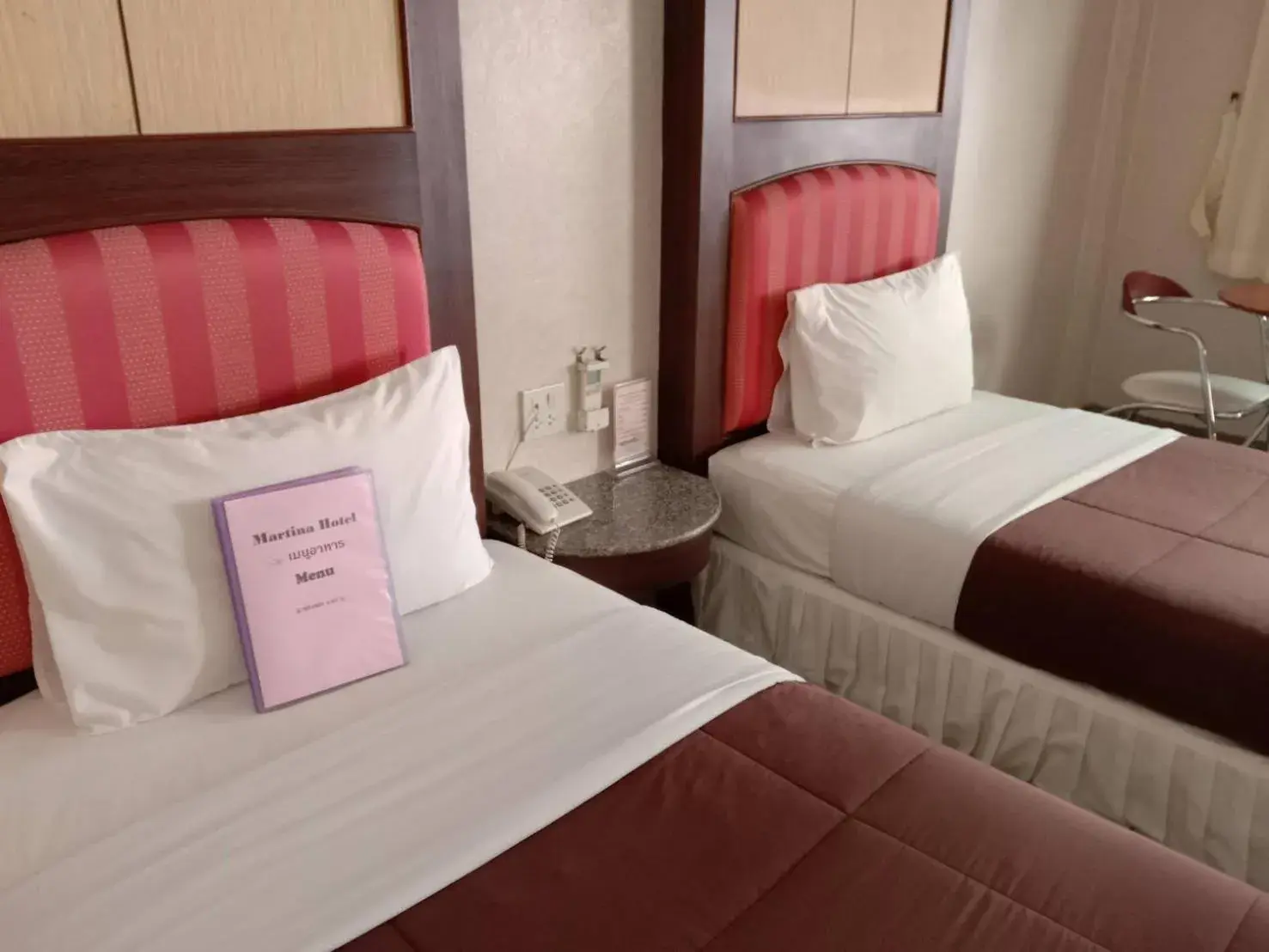 Bed in Martina Hotel Surin Bed in Martina Hotel Surin