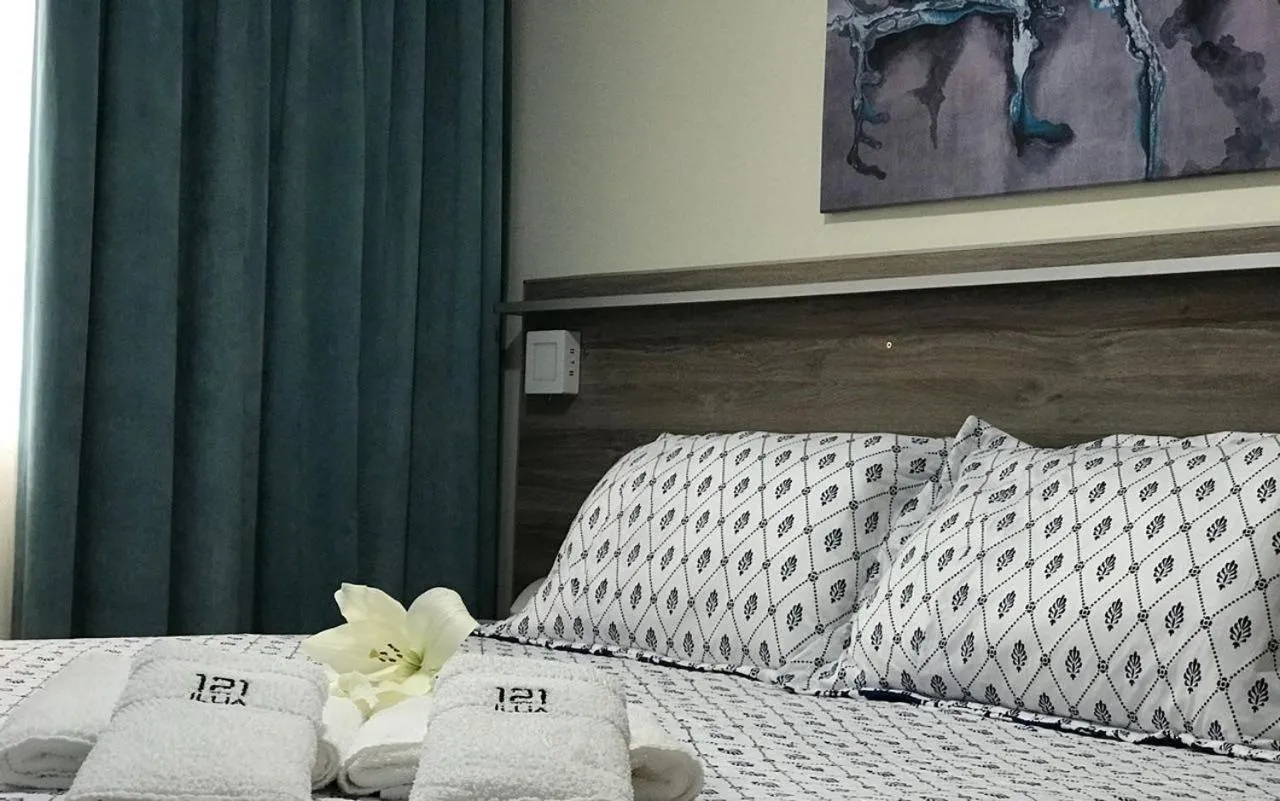 Bed in ILLIA 121 APART HOTEL