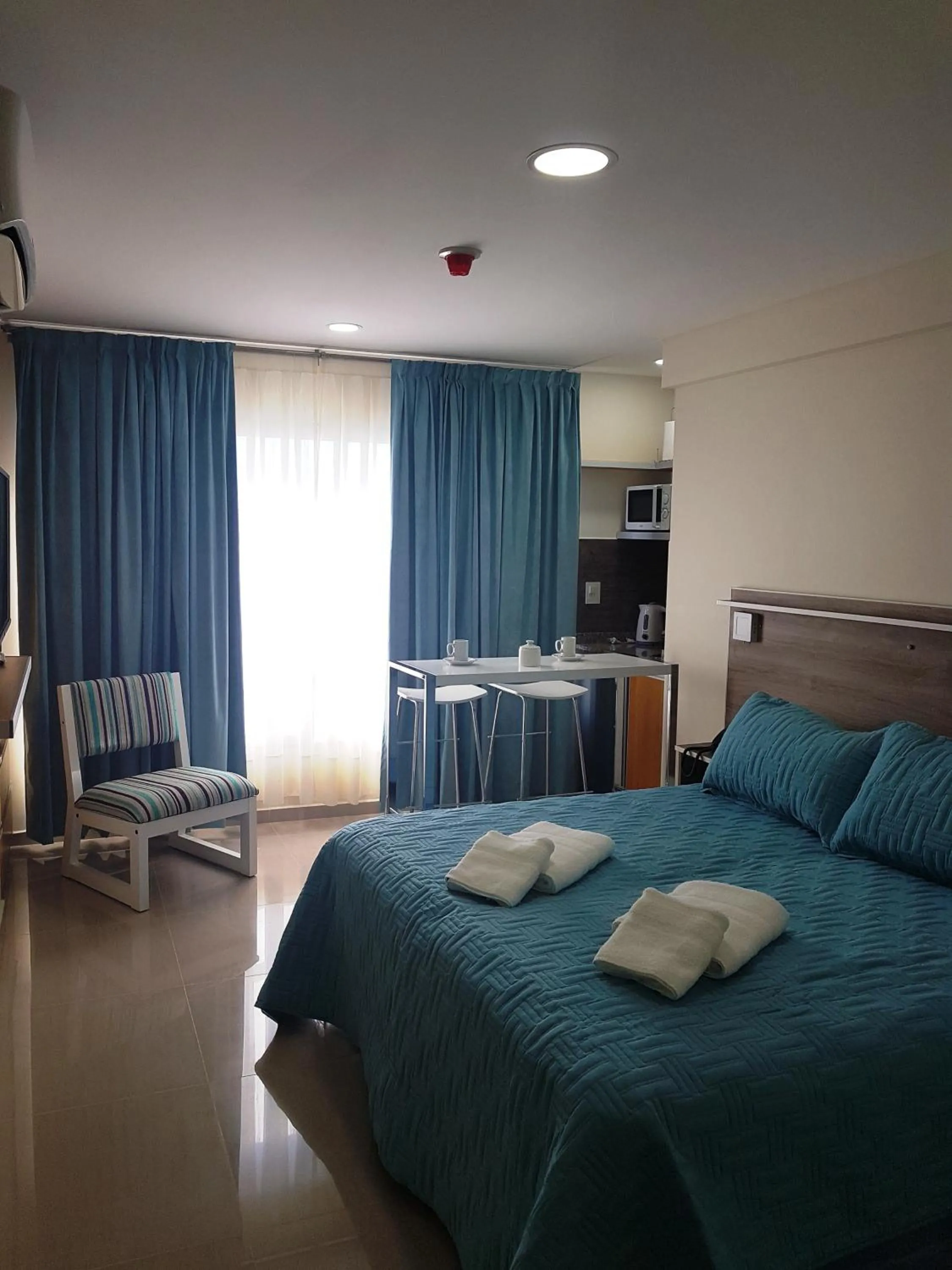 Bed in ILLIA 121 APART HOTEL