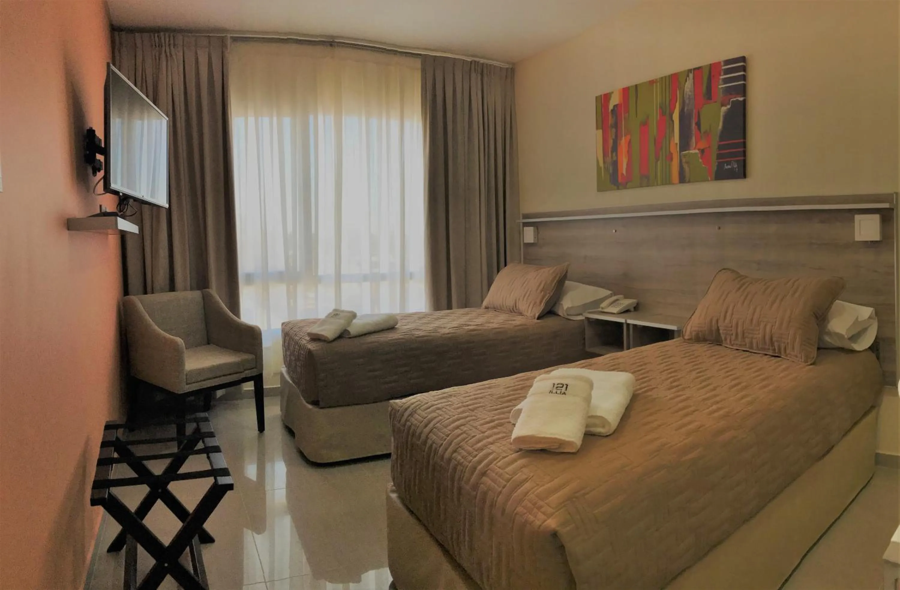 Bed in ILLIA 121 APART HOTEL