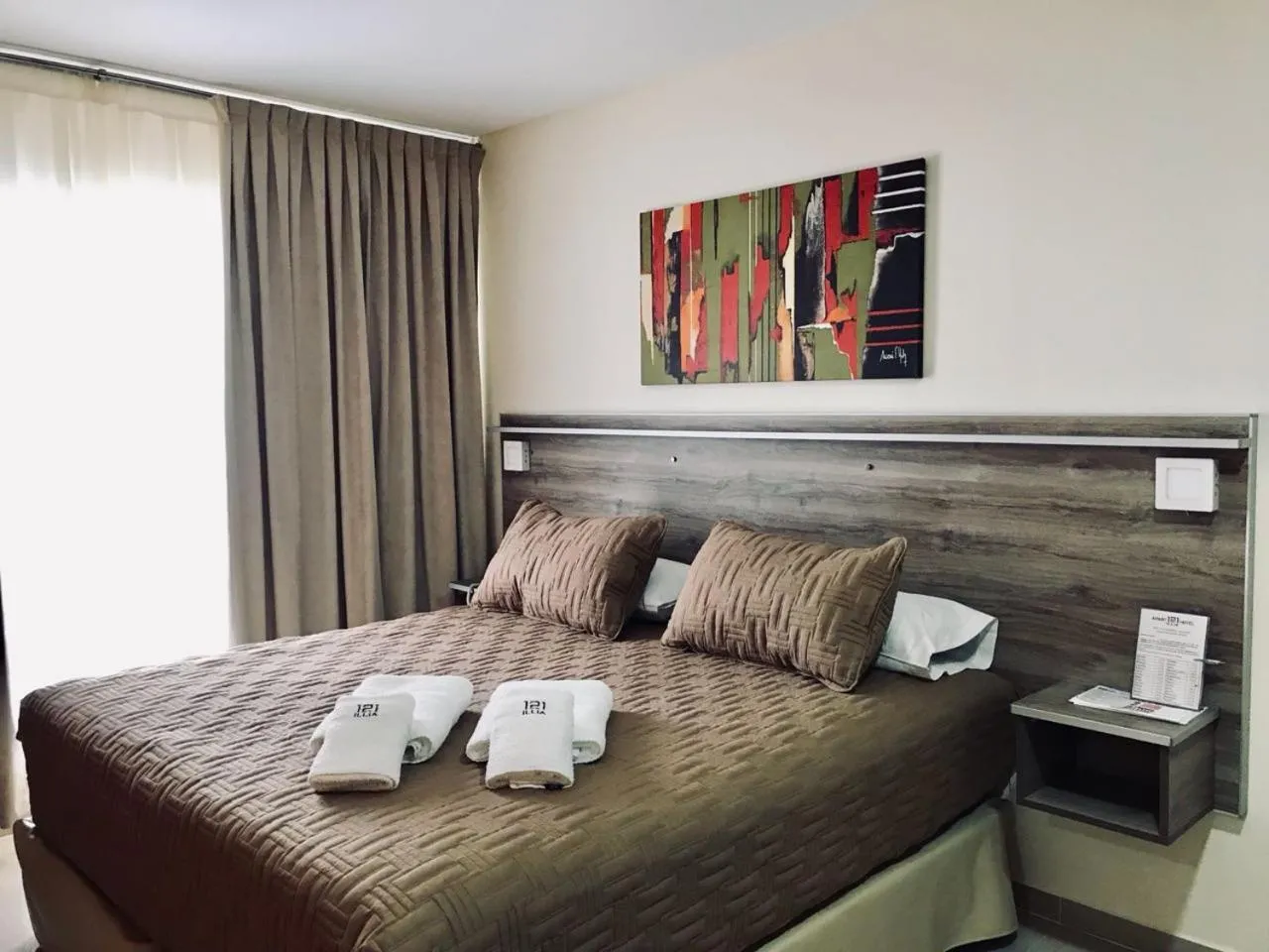 Bed in ILLIA 121 APART HOTEL