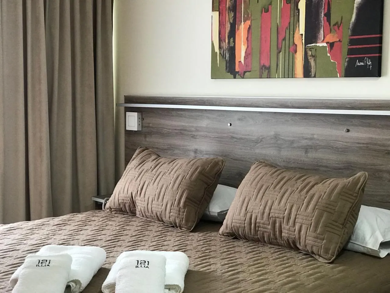 Bed in ILLIA 121 APART HOTEL