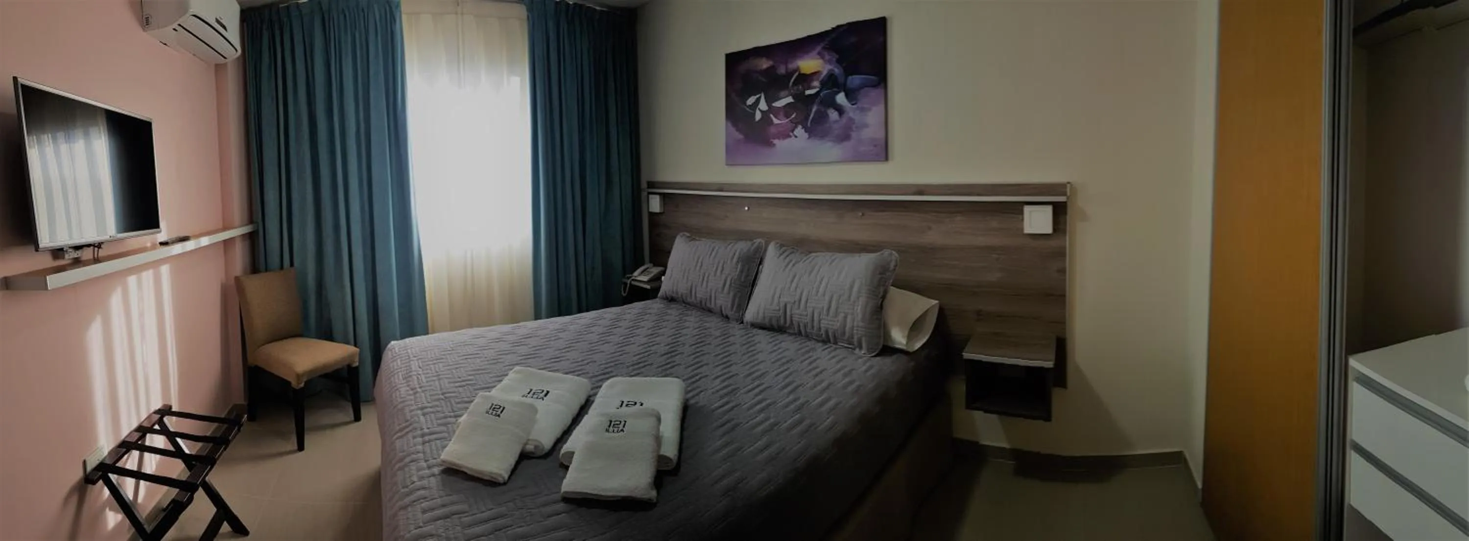Bed in ILLIA 121 APART HOTEL