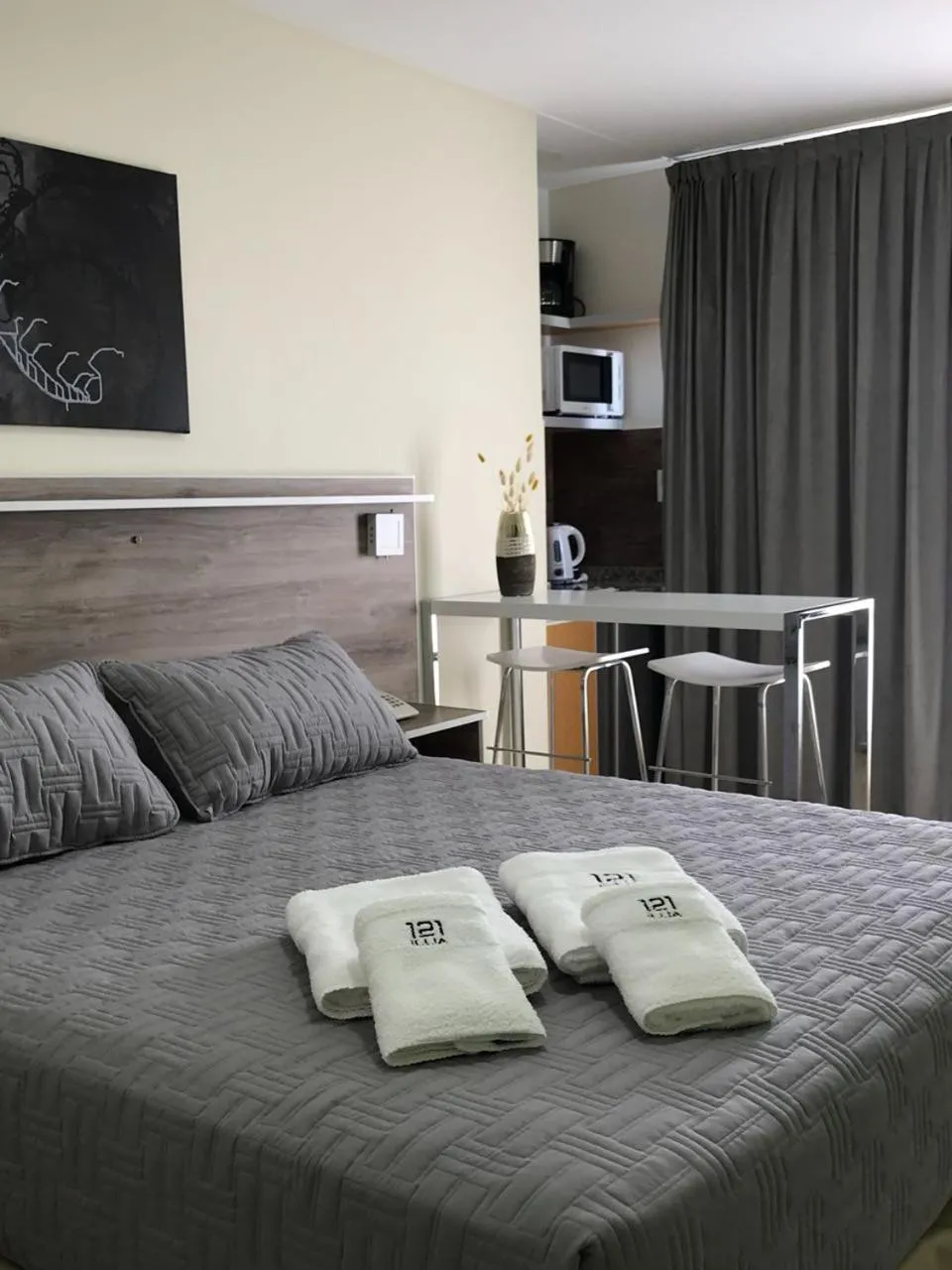 Bed in ILLIA 121 APART HOTEL