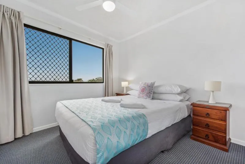 Bed in San Marino by the Sea Apartments