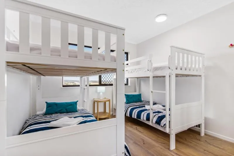 Bed in San Marino by the Sea Apartments