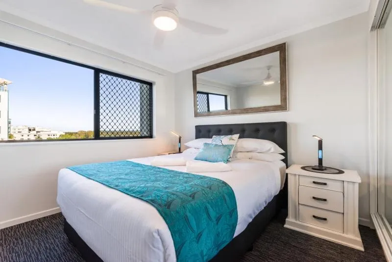 Bed in San Marino by the Sea Apartments