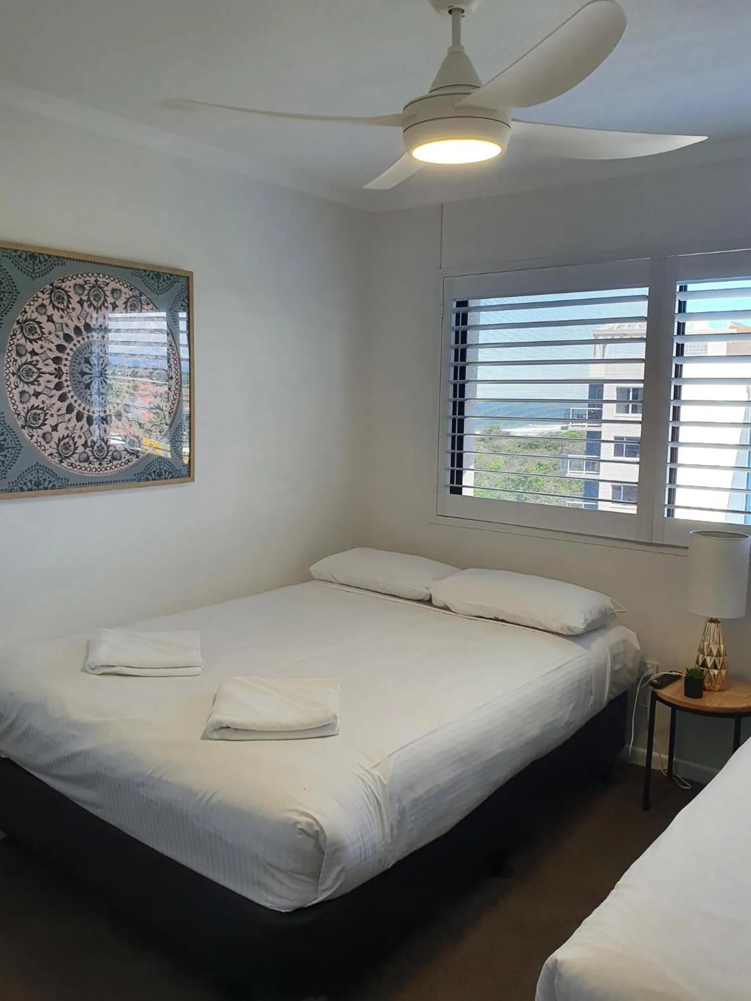 Bed in San Marino by the Sea Apartments