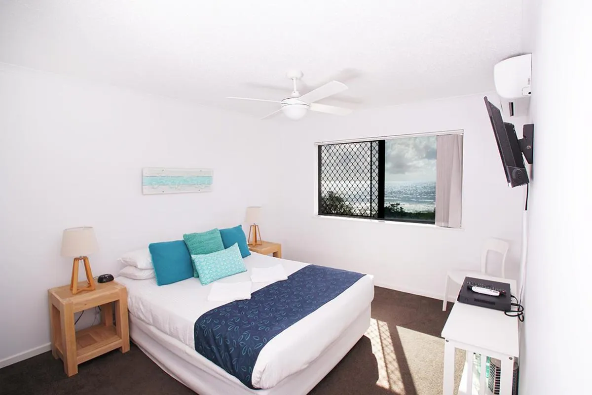 Bed in San Marino by the Sea Apartments