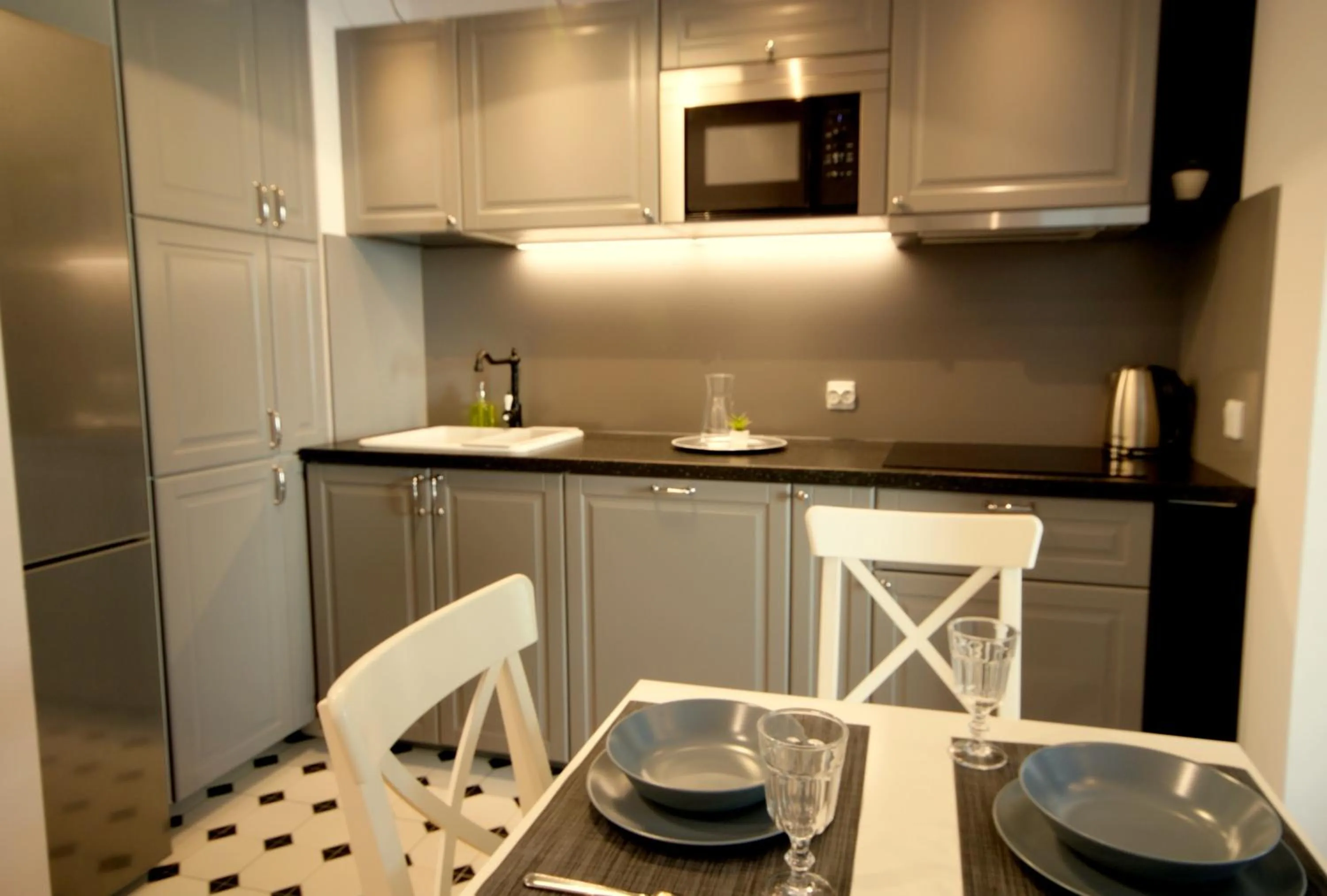 Kitchen or kitchenette in IRS ROYAL APARTMENTS Apartamenty IRS Neptun Park