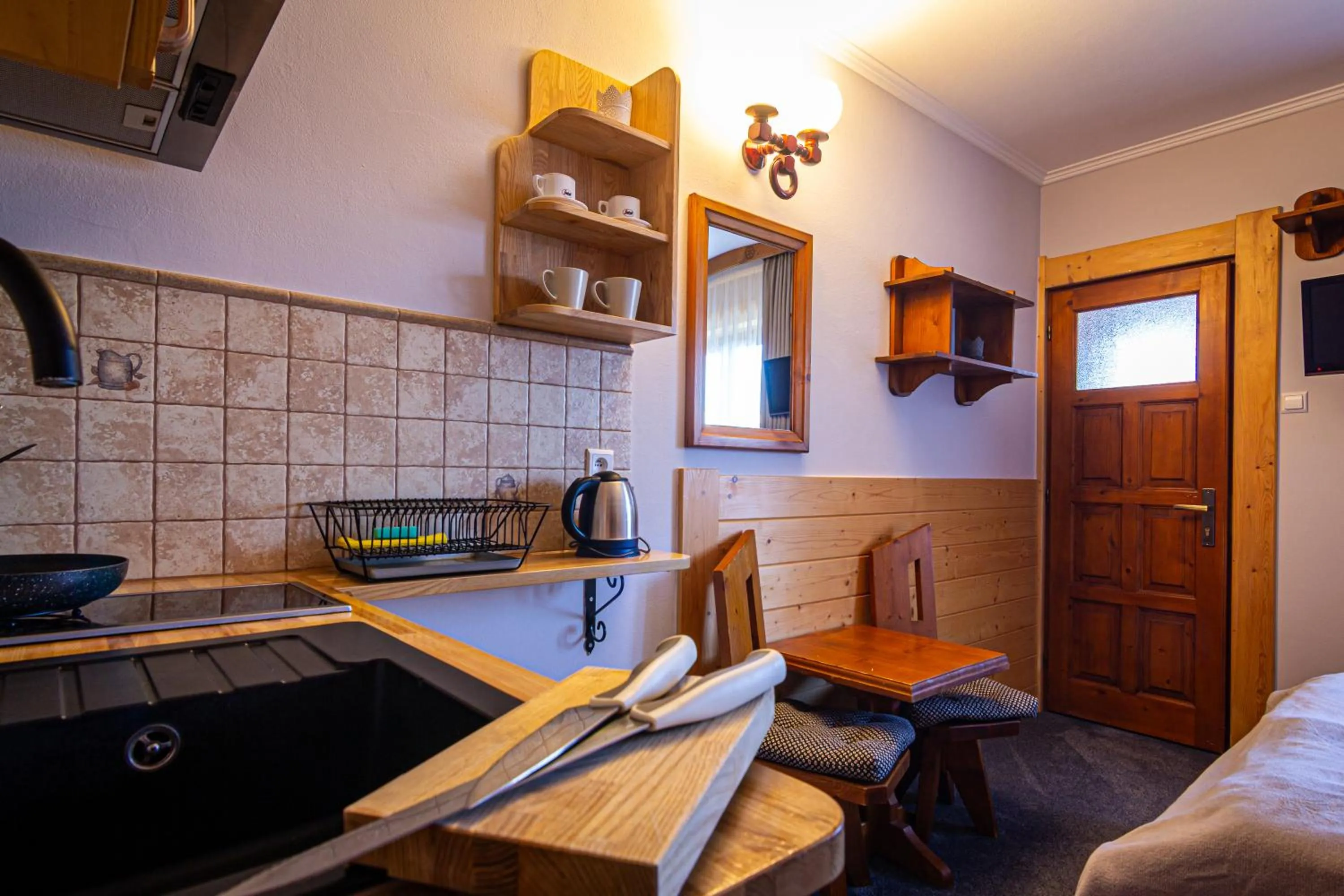 Photo of the whole room in Aparthotel Pod Nosalem