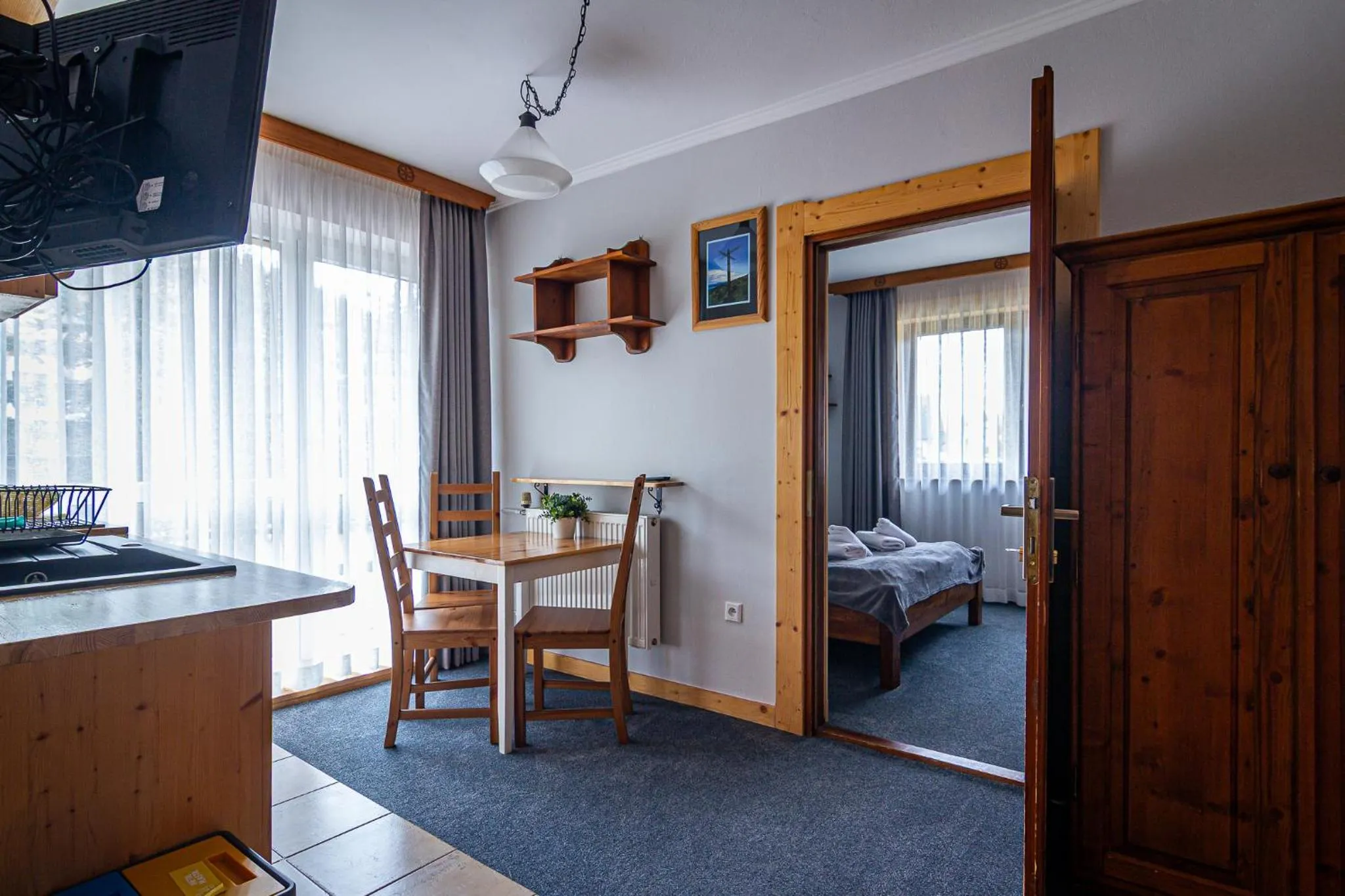 Kitchen or kitchenette, Bed in Aparthotel Pod Nosalem