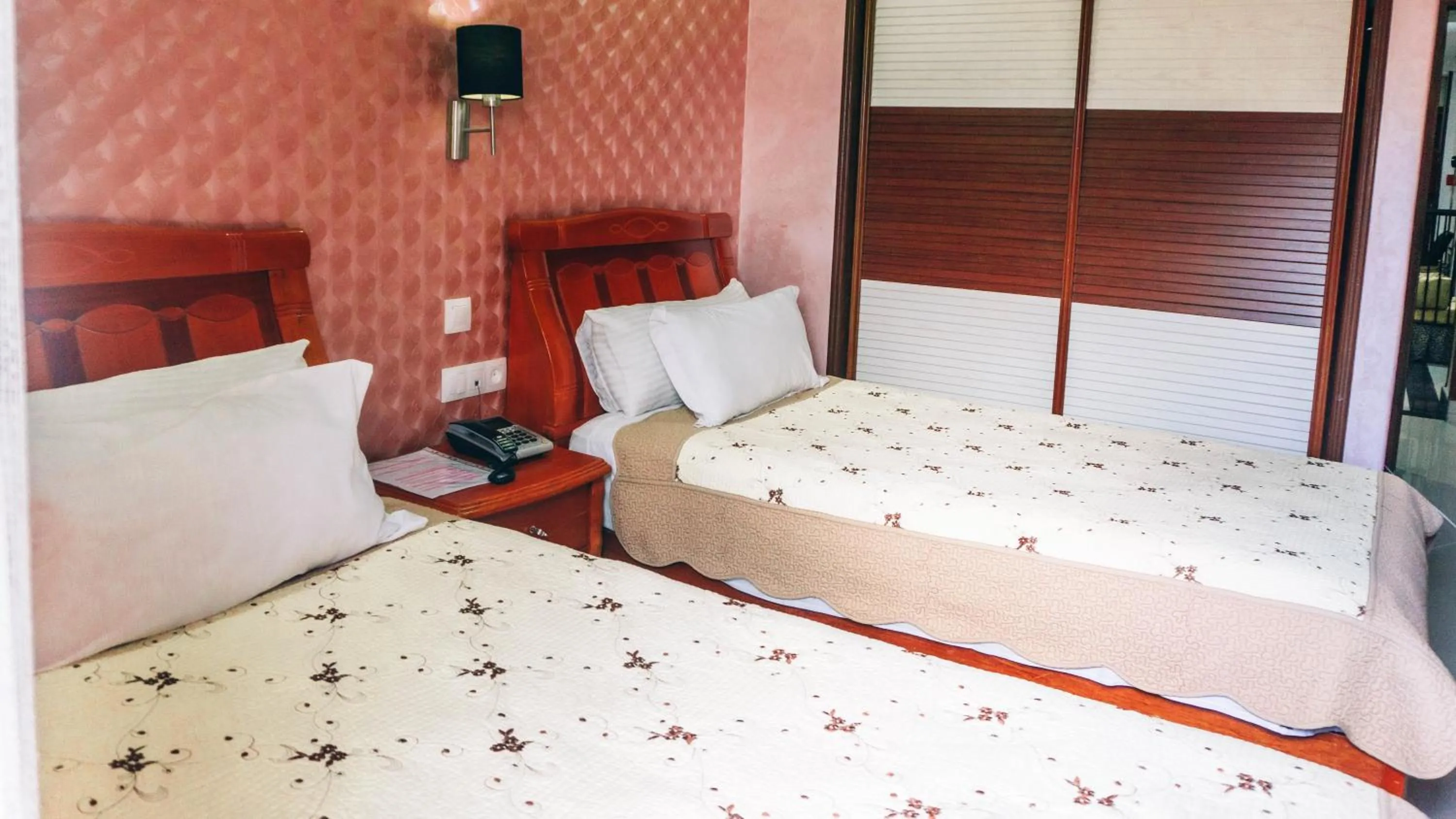 Bed in Hôtel Atenas