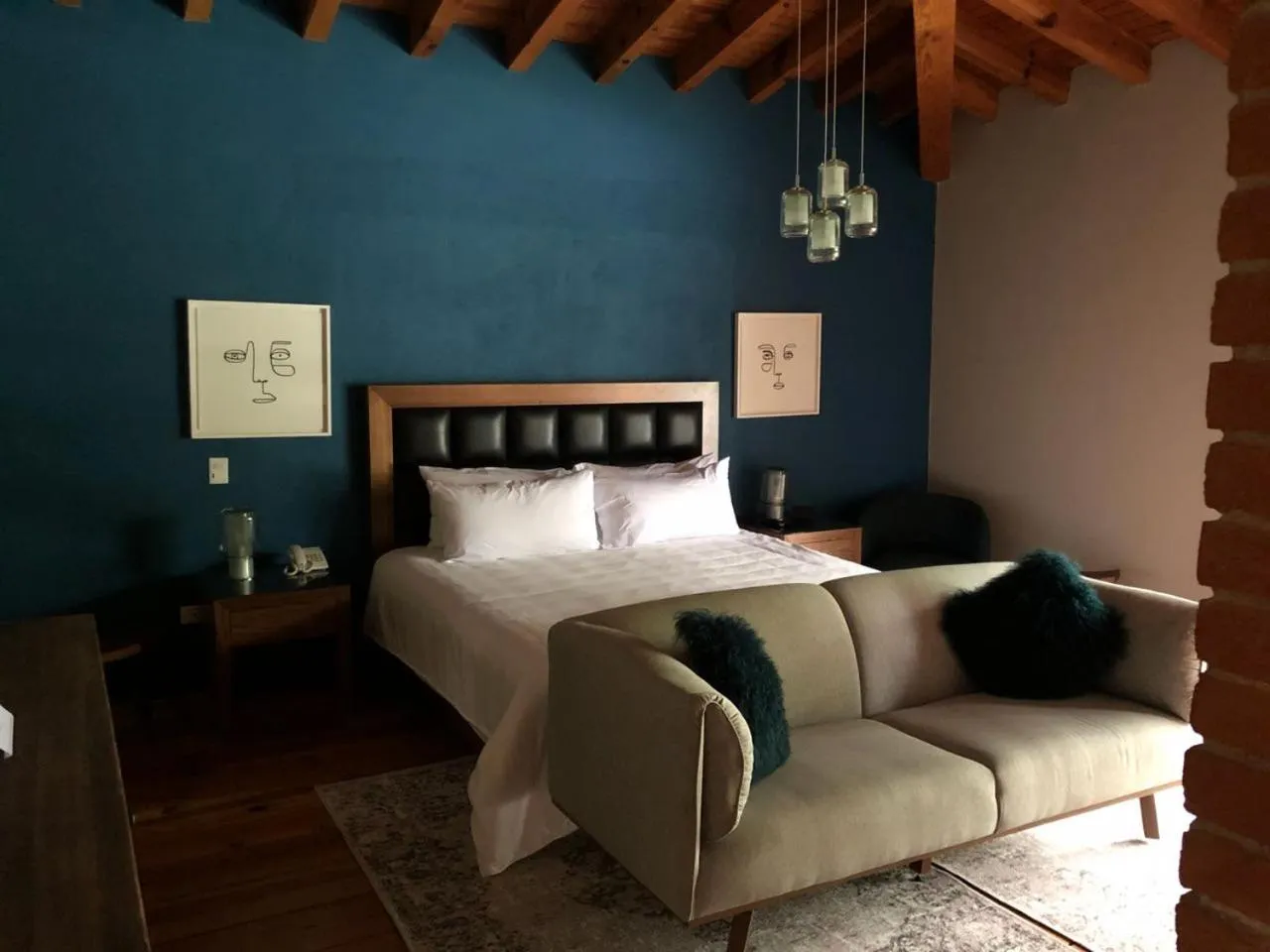 Seating area, Bed in Hotel Boutique Unico Avandaro