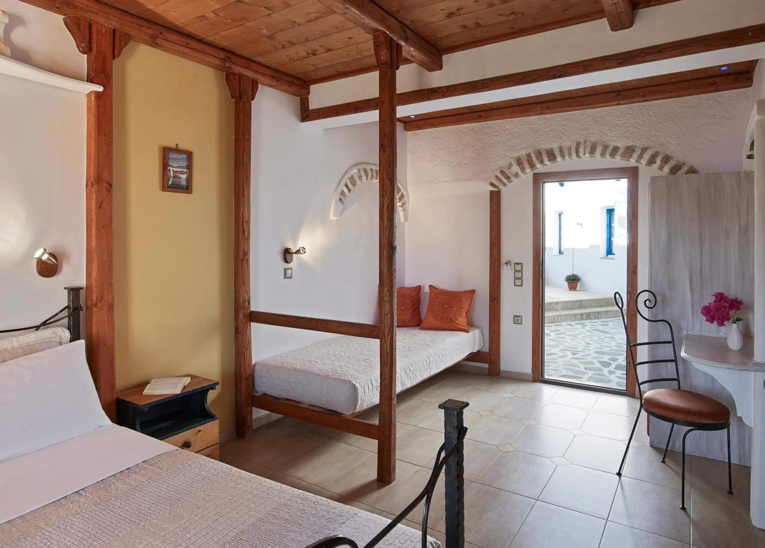 Bed in Polikandia Hotel