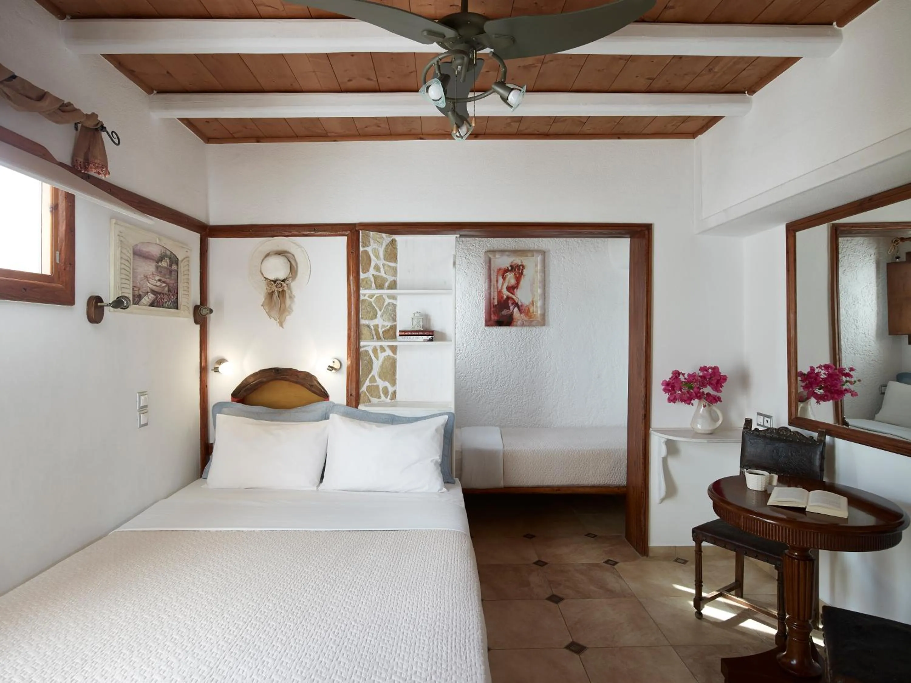 Bed in Polikandia Hotel