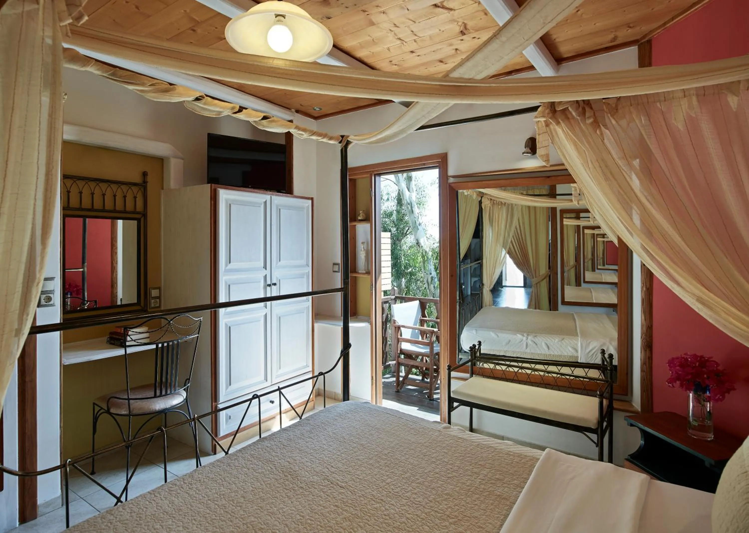 Bed in Polikandia Hotel