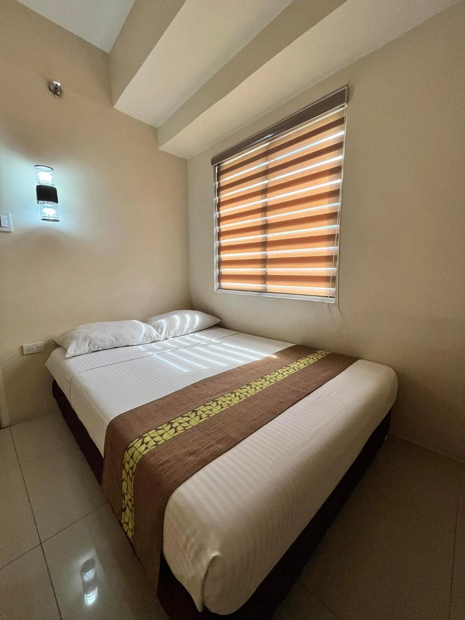Bed in Eon Centennial Express Hotel